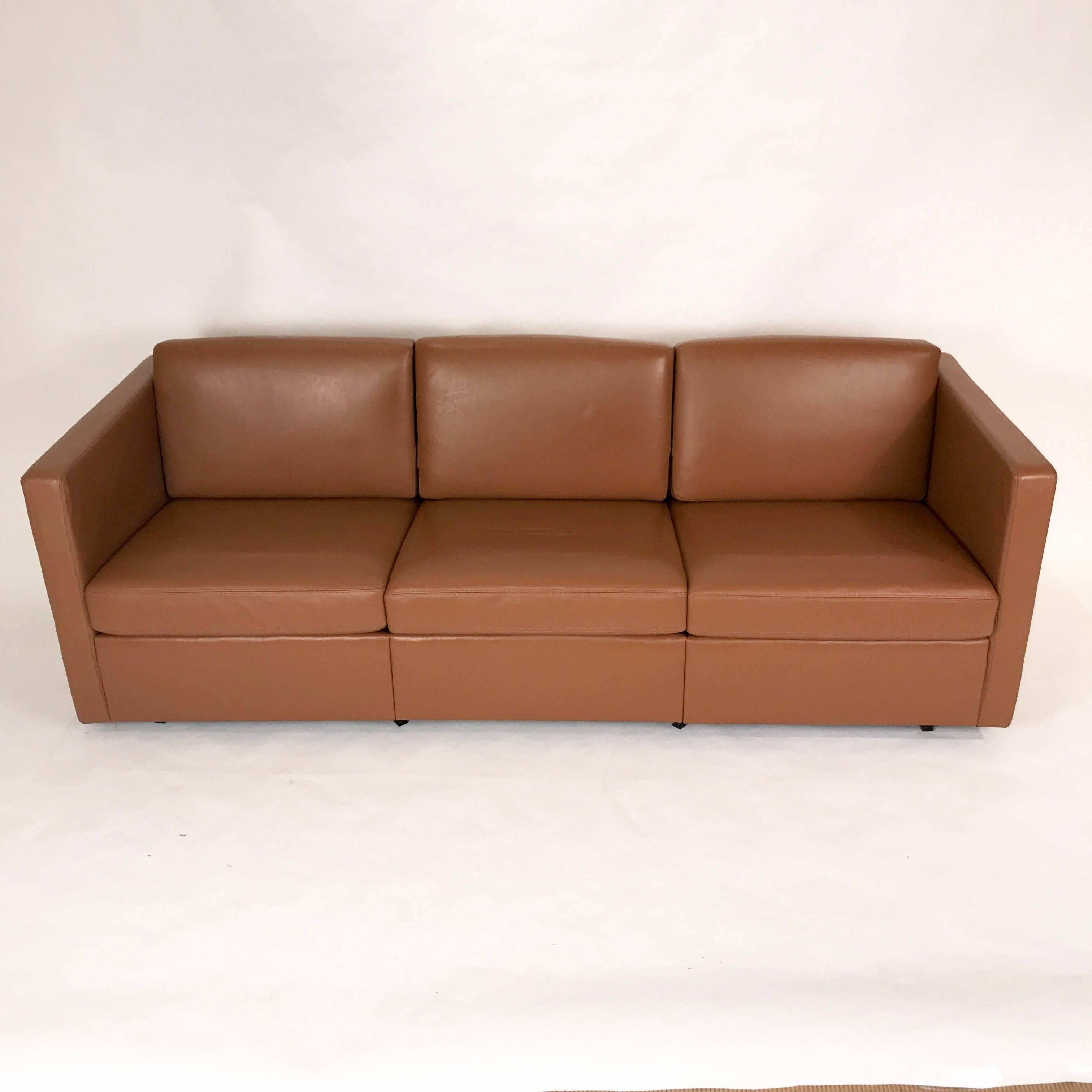 Fantastic, near excellent condition Charles Pfister for Knoll three-seat sofa in a sturdy carmel colored leather with lovely box stitched edges all around. Steel feet.