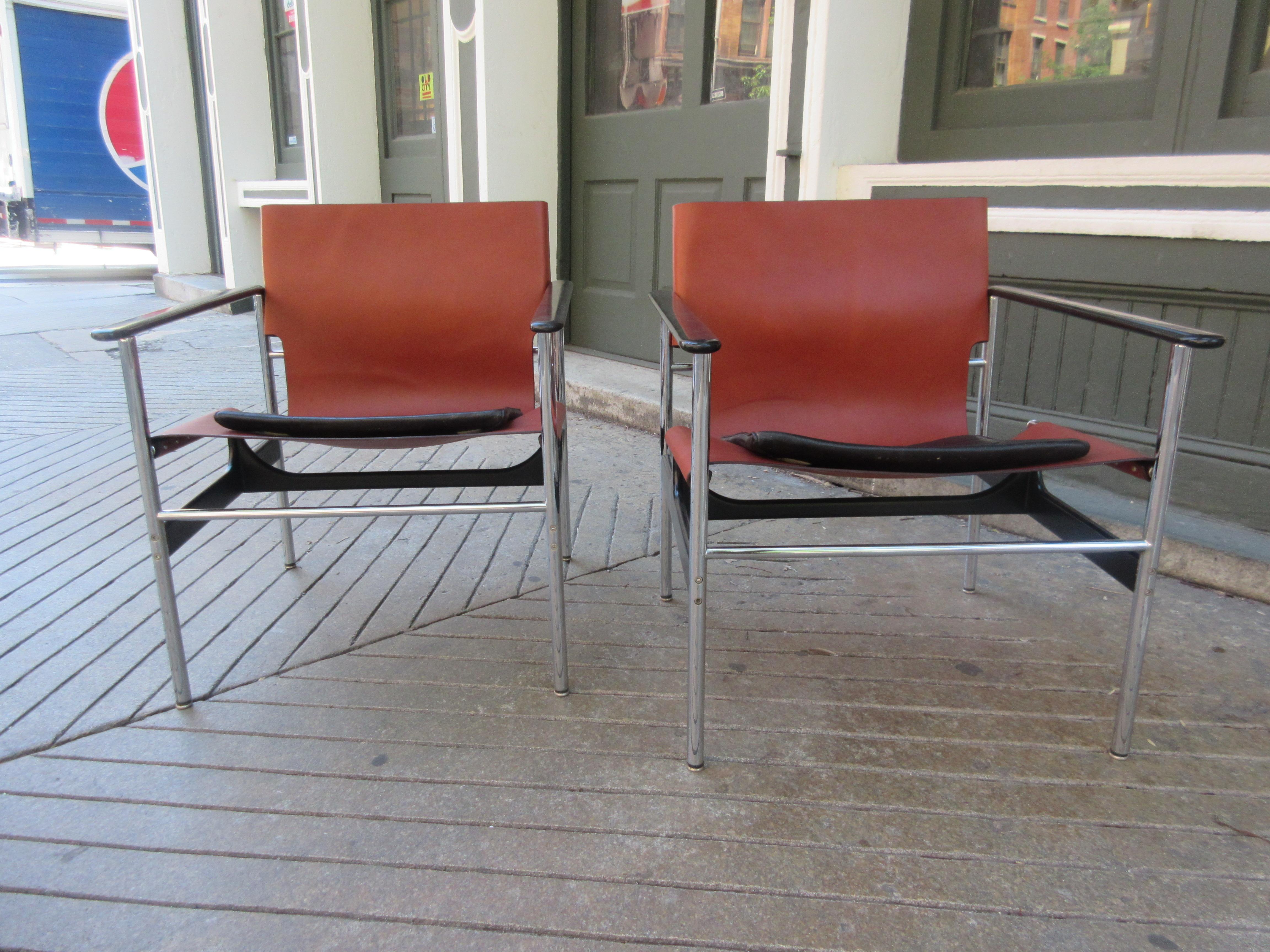 Charles Pollack for Knoll Model 657 leather sling chairs in chestnut leather slings with original black seat cushion. Leather slings are newly redone. Chrome and plastic arms are in excellent original condition.