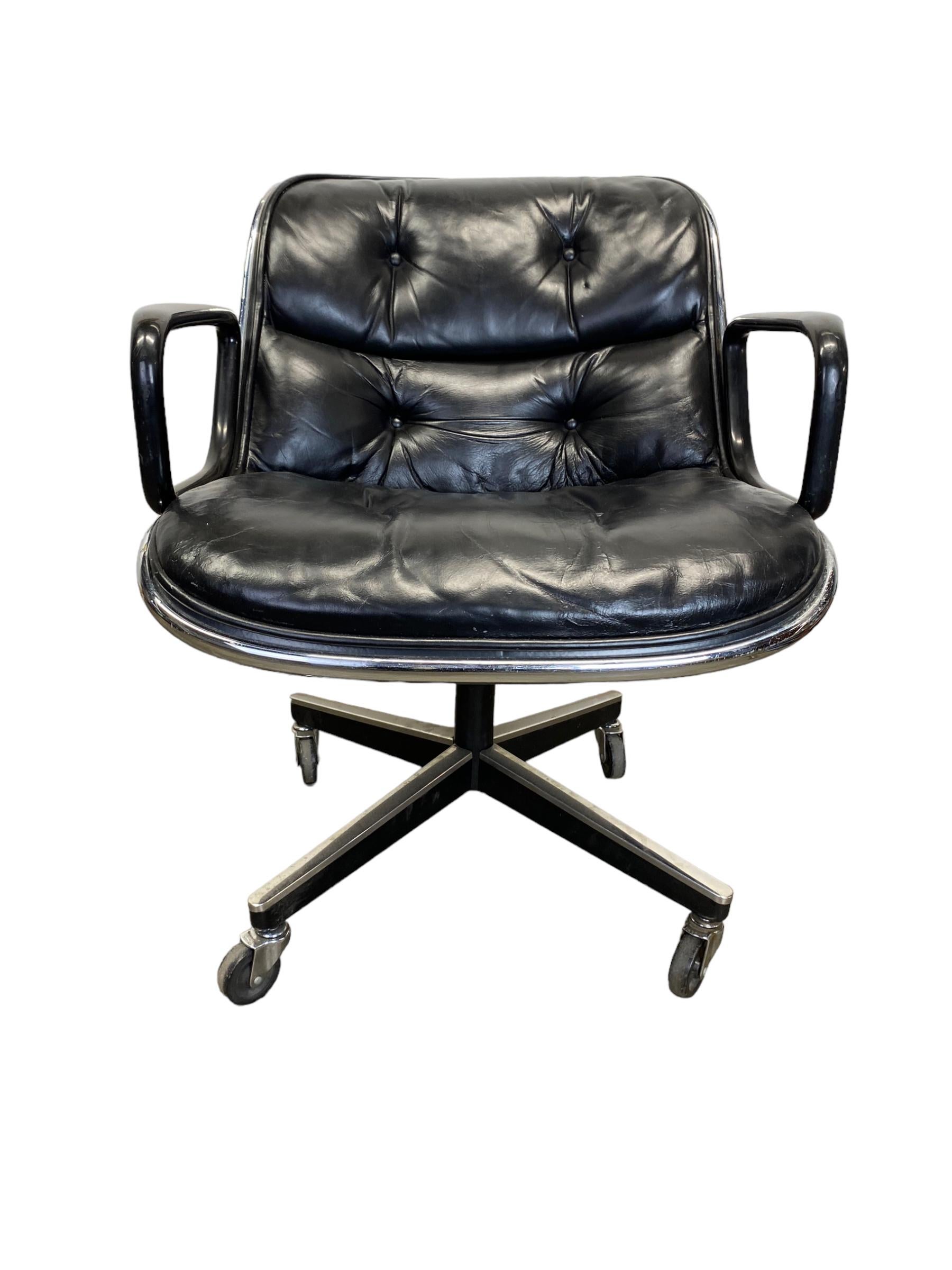 Vintage Charles Pollock for Knoll executive chair in black blue leather. This executive desk chair has a swivel base with manual adjustable height. Base with all wheels in working condition. Good vintage condition, wear consistent with age and use.