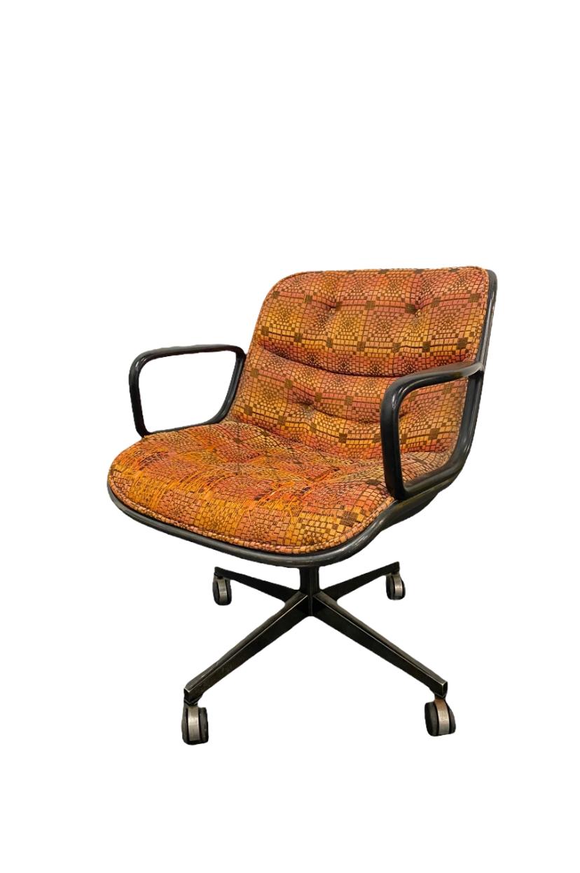 Vintage Charles Pollock for Knoll executive chair in geometric orange and yellow upholstery. Knoll International label. Fair vintage condition, wear consistent with age and use. Extremely comfortable and a classic Mid-Century Modern design. May ship