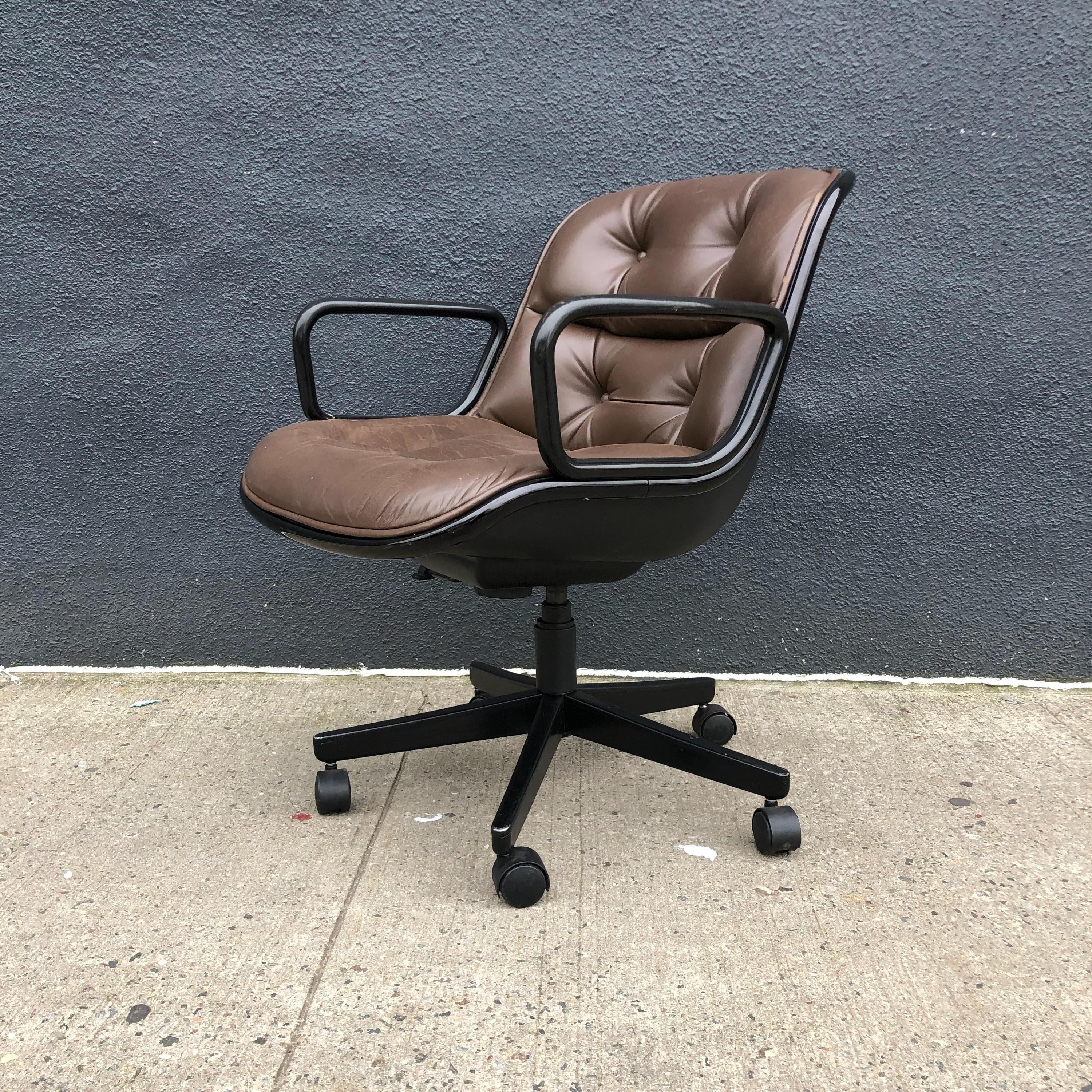 For your consideration are icons of Mid-Century Modern design office chairs by Charles Pollock for Knoll. 

These chairs, with a hard plastic back, aluminium frame and tufted leather seat, revolutionized office seating. They have been in