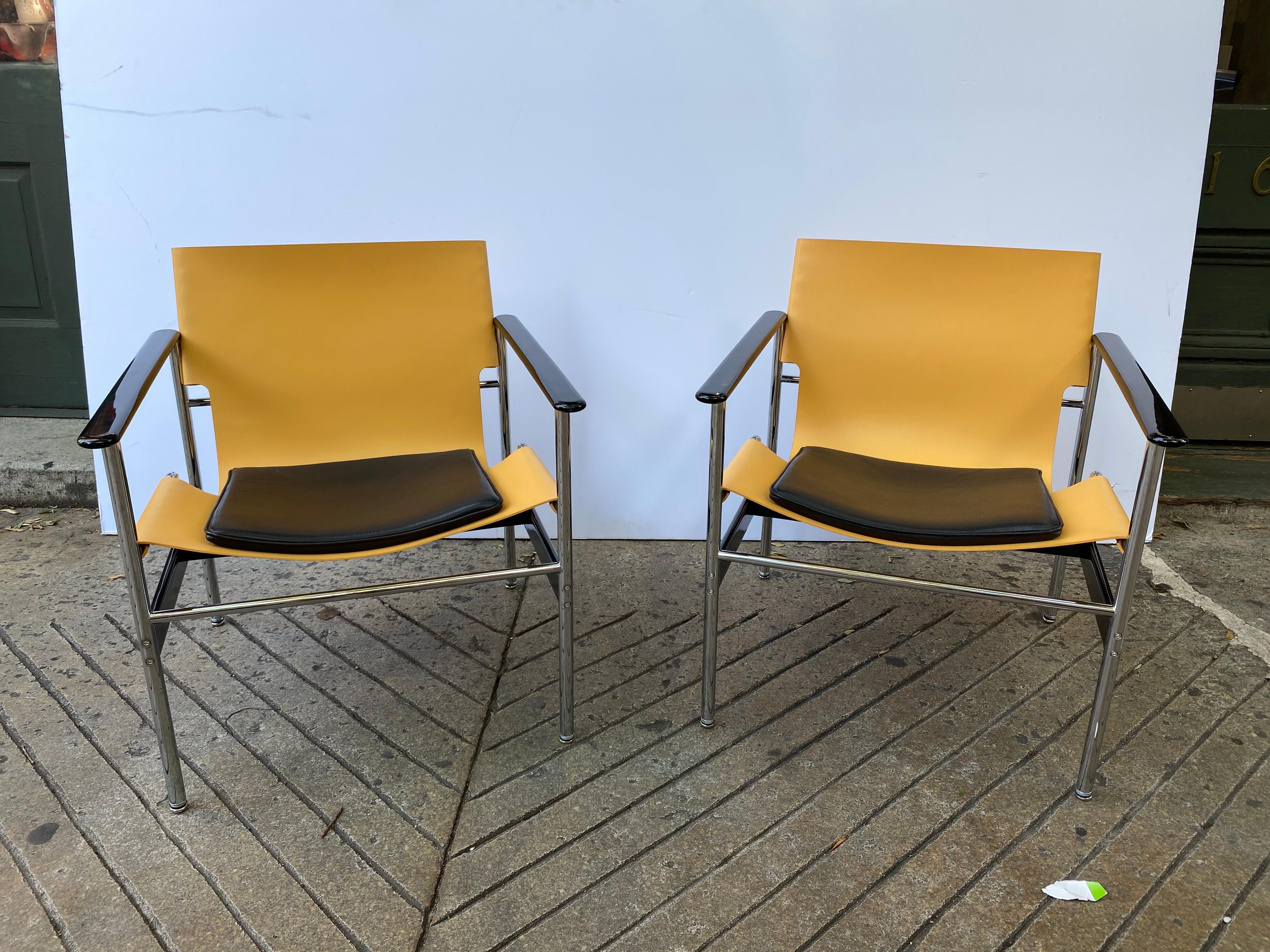 Pollack for Knoll leather sling chairs, first designed in 1960 and reintroduced by knoll about 6-7 years ago. These chairs are in new like condition! Extremely clean, near perfect! About 6 years old, tan slings with a black seat pad. Beautiful