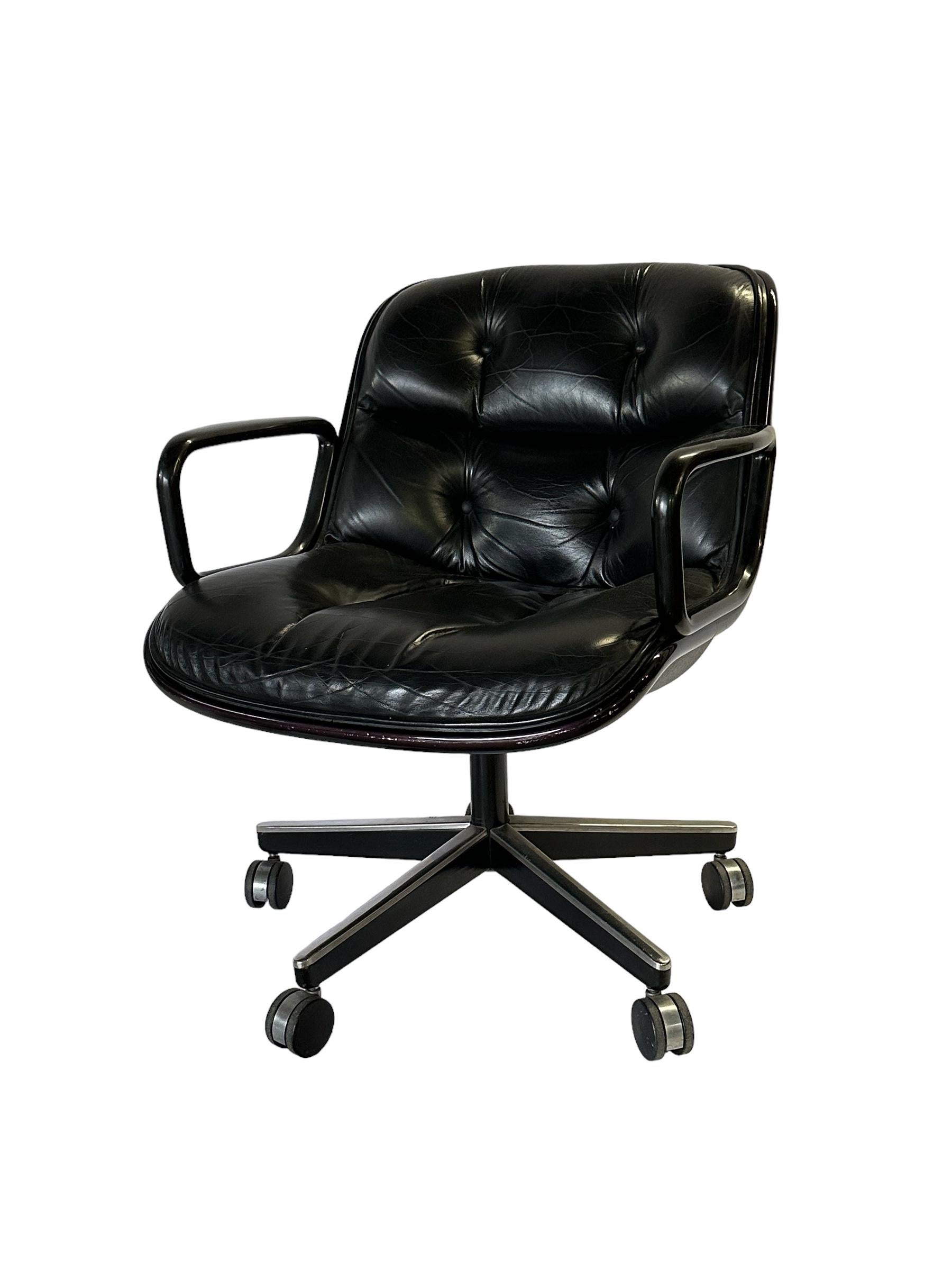 Classic Charles Pollock desk chair by Knoll. circa 1970s production executed in black leather. All screws, buttons, and wheels intact. No torn leather. Signed and guaranteed authentic. Perhaps the most comfortable desk chair out there, and certainly