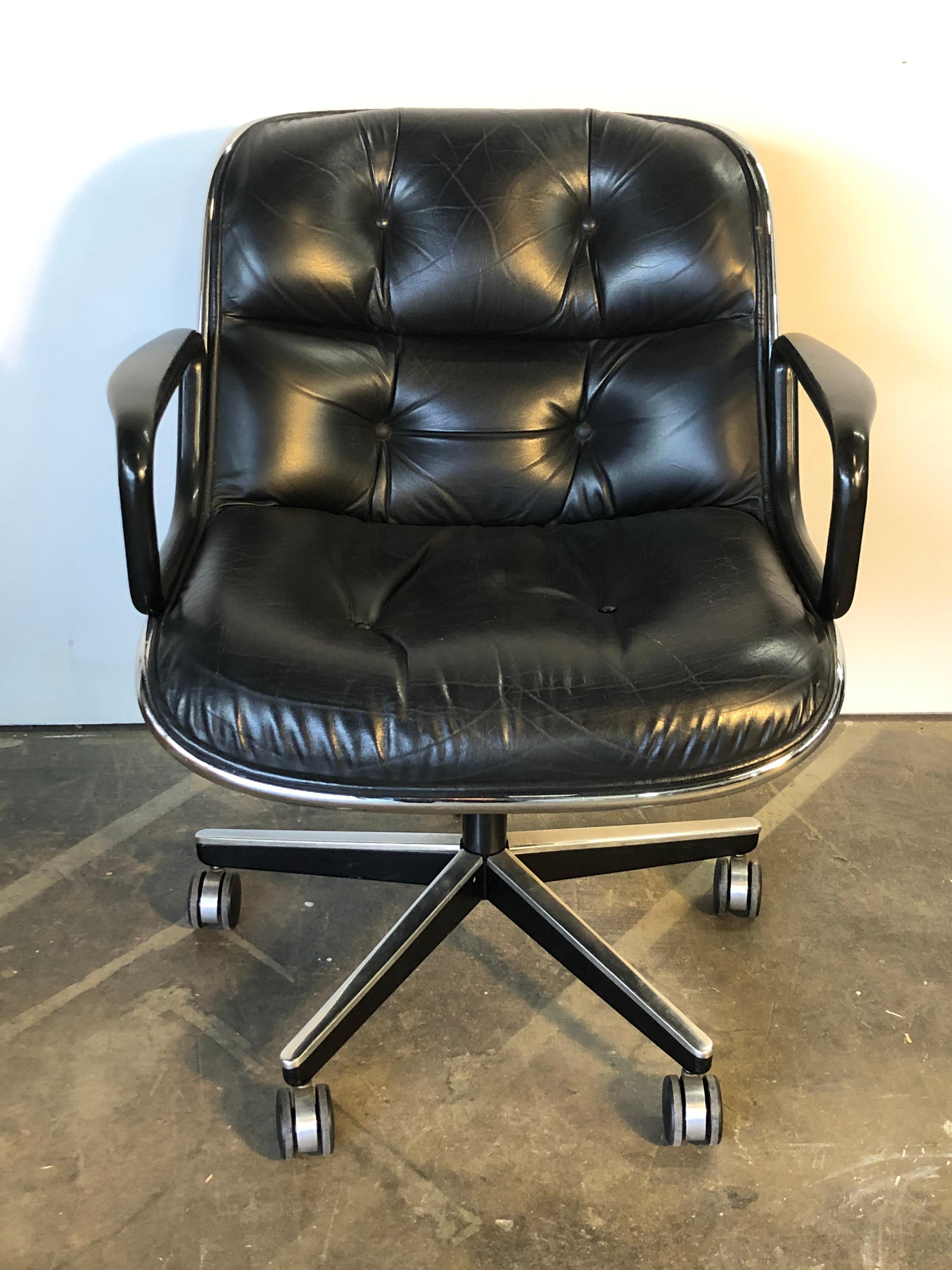 Wonderful edition of the iconic American office chair. Charles Pollock designed this uber comfortable office chair for Knoll. Retains original manufacturer label. Finished in black leather with no tears and all buttons intact. In very good