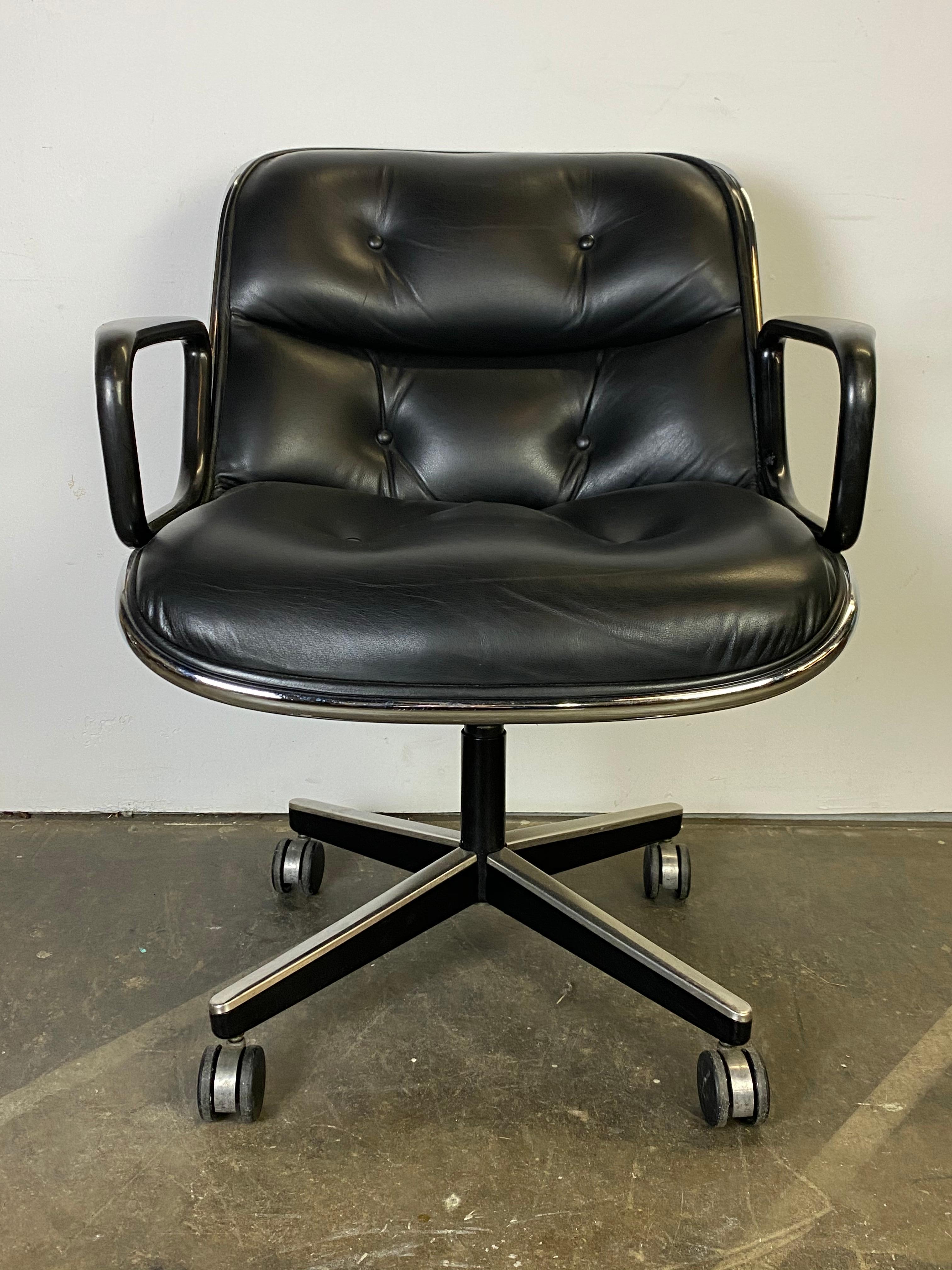 Wonderful edition of the iconic American office chair. Charles Pollock designed this uber comfortable office chair for Knoll. Retains original manufacturer label. Finished in black leather with no tears and all buttons intact. In very good