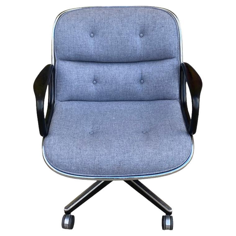 Fresh and uncommon edition of the classic Charles Pollock office chair for Knoll. Executed in a crisp gray wool fabric, black arms and back, with chrome rim. All buttons and wheels intact. This features the adjustable height base with tilt and