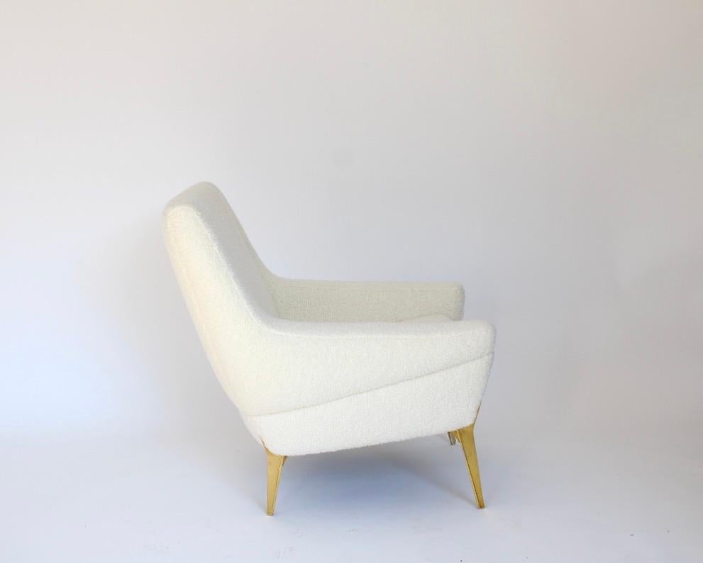 Charles Ramos, lounge chair, redone in Italian Alpaca wool bouclé on gilded aluminum legs. Minimal, elegant, graceful and yet comfortable. Coming from a cabinetmaker family, Charles Ramos was a self taught designer and interior architect, beginning
