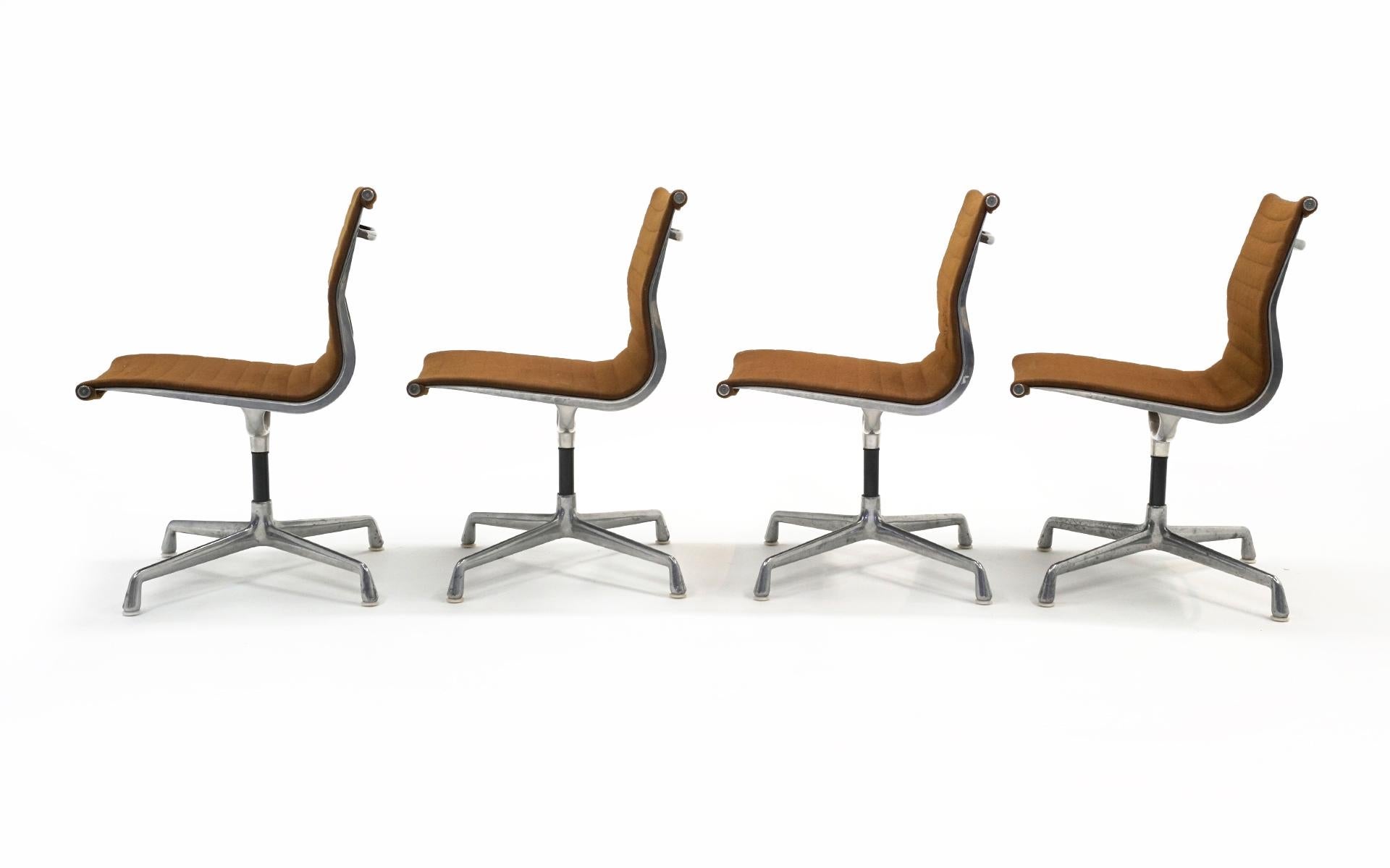 American Charles & Ray Eames Armless Aluminum Group Swivel Chairs. Aluminum, Brown Fabric