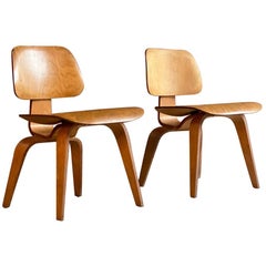 Charles and Ray Eames DCW Chairs by Evans Pair of Mid-Century Modern, USA, 1950