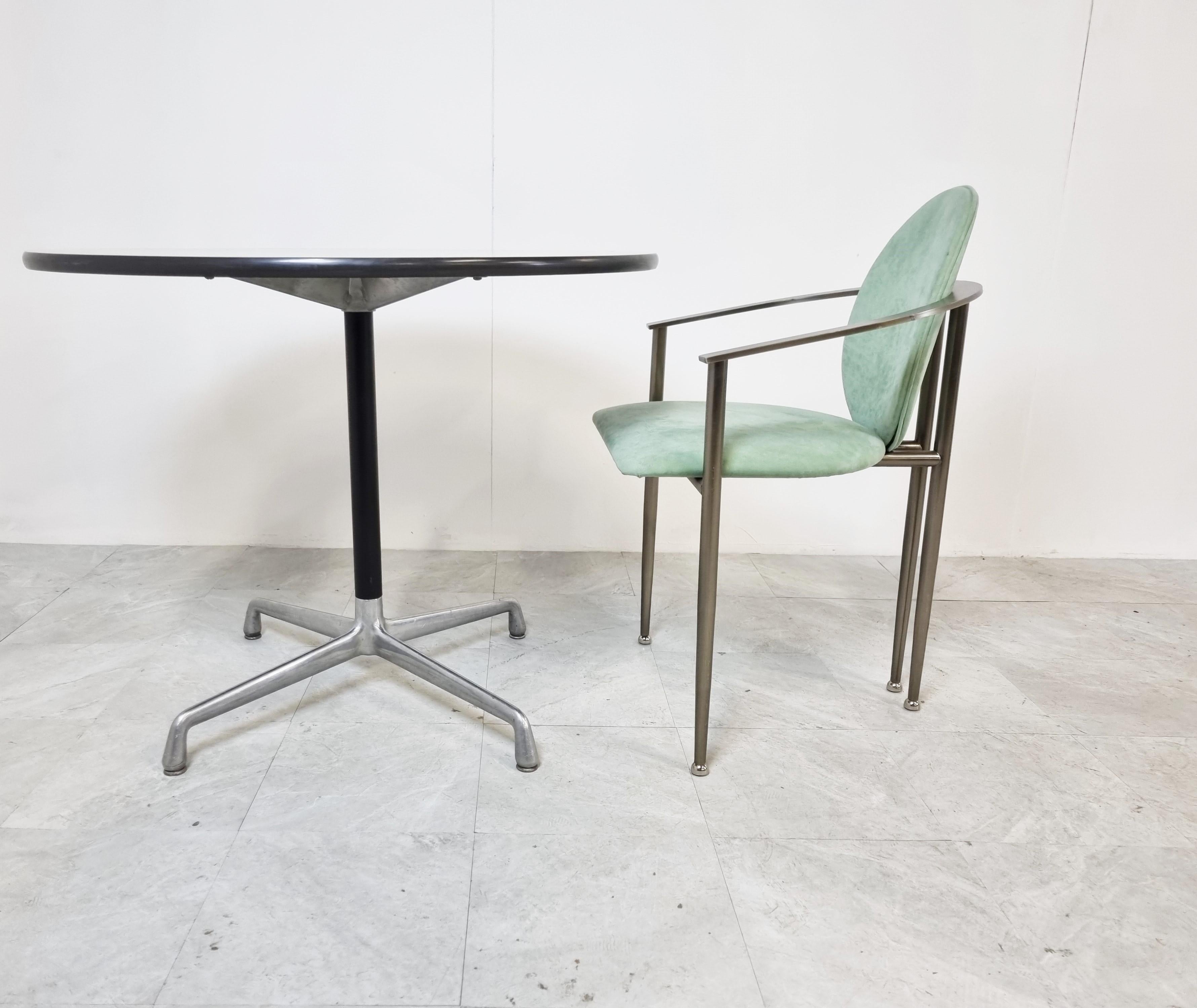 Vintage 'contract' dining or side table by Charles and Ray Eames for Herman Miller.

The Eames contract tables were designed together with the Aluminium Group chairs and feature the latter's cruciform base

The table is in good original