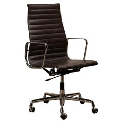 Charles & Ray Eames EA119 Executive Office chair in dark brown leather for Vitra