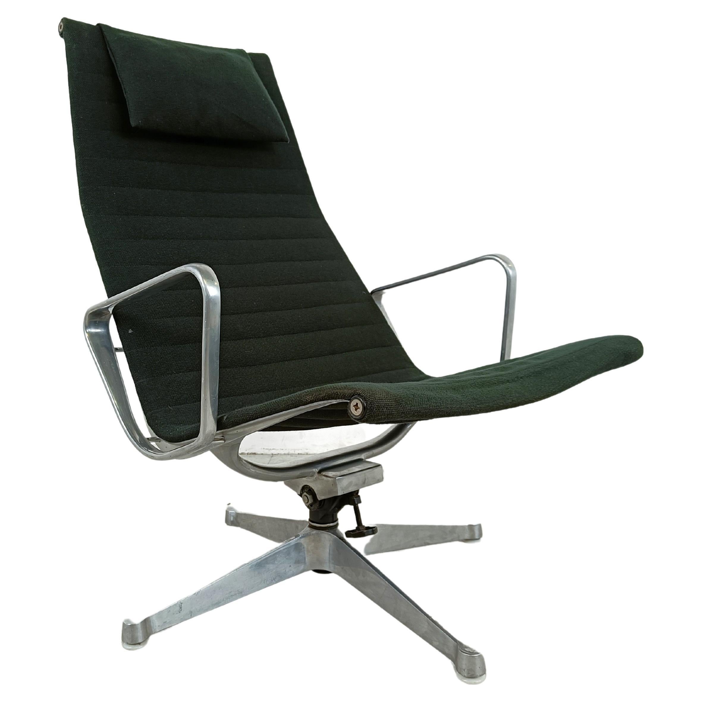 Charles & Ray Eames EA124 Lounge chair in black fabric, 1970s