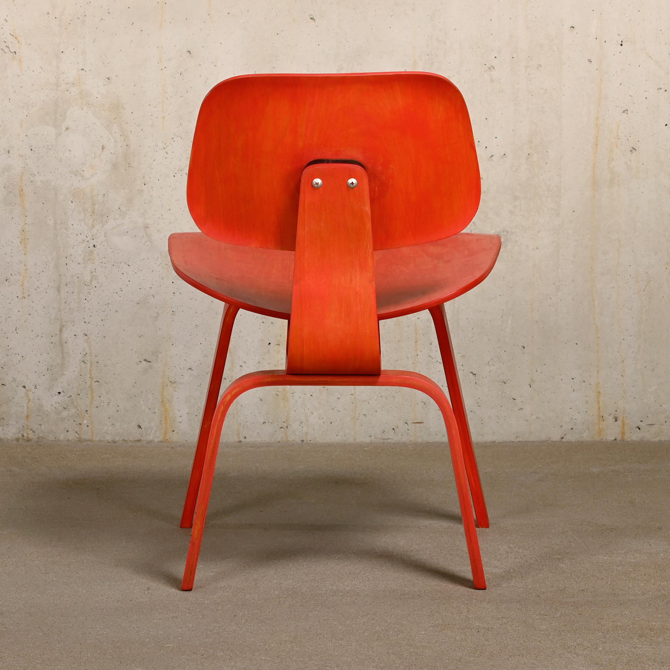 Molded Charles & Ray Eames Early DCW Red aniline dye Ash Dining Chair for Evans Plywood