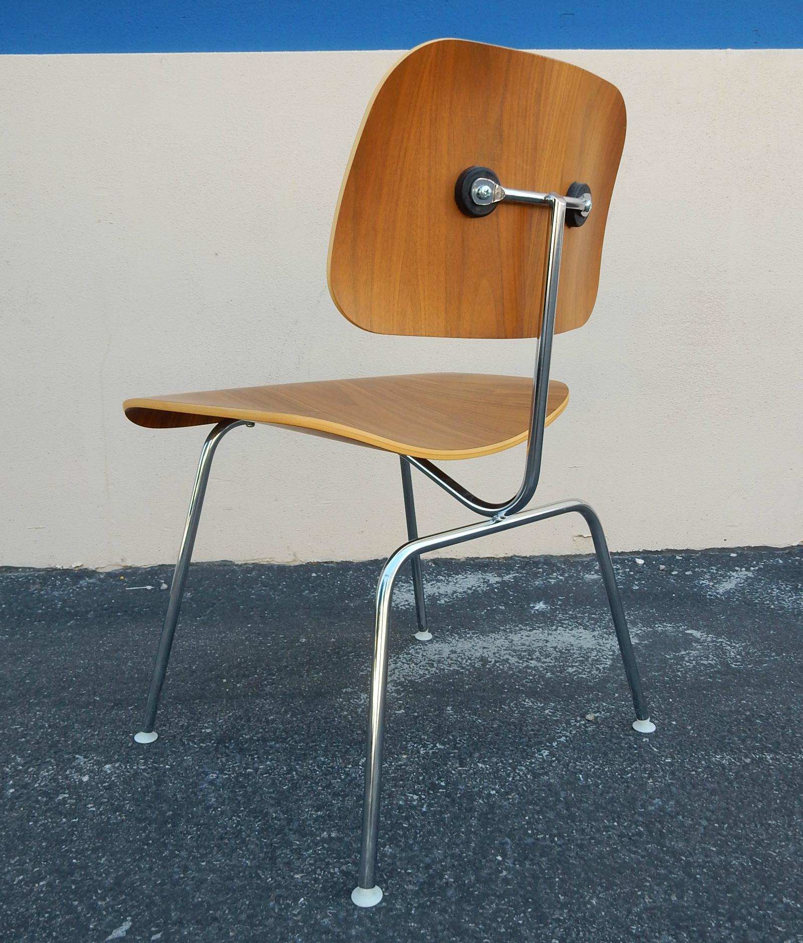 16 available at the start of listing...
Authentic Charles & Ray Eames designed for Herman Miller model DCM
dining chair in chrome and walnut.
Mfg. dated 2007.
All in un-restored, excellent, barley used condition.
Priced per chair...