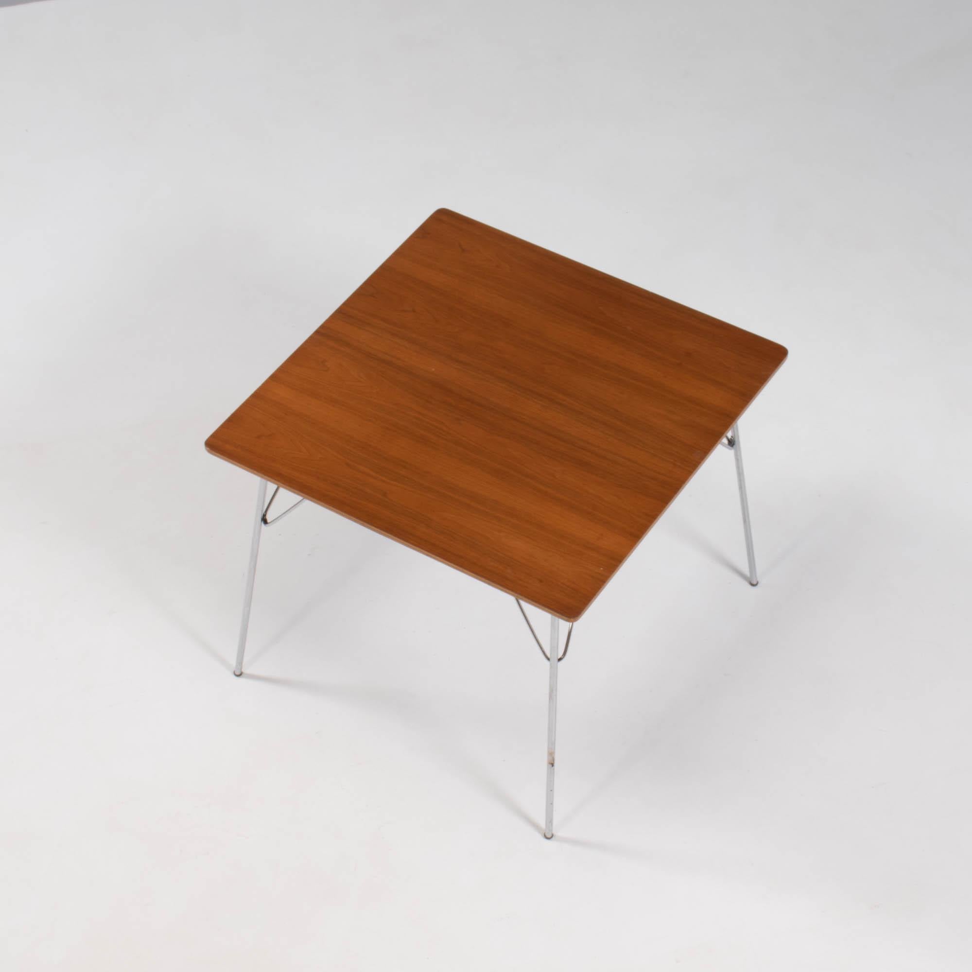 Originally released in 1947, the DTM Table had four variants. The DTM-2 was the square table with a natural veneer top. Herman Miller manufactured the tables until 1964 when it was discontinued.

The ingenious design by Charles and Ray Eames