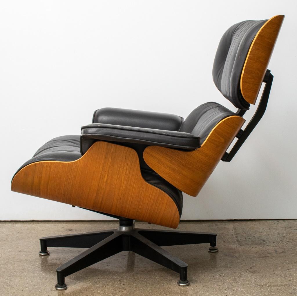 Charles and Ray Eames (American, 1907-1978; 1912-1988) for Herman Miller Mid-Century Modern Lounge Chair, with black leather upholstery. 32.5