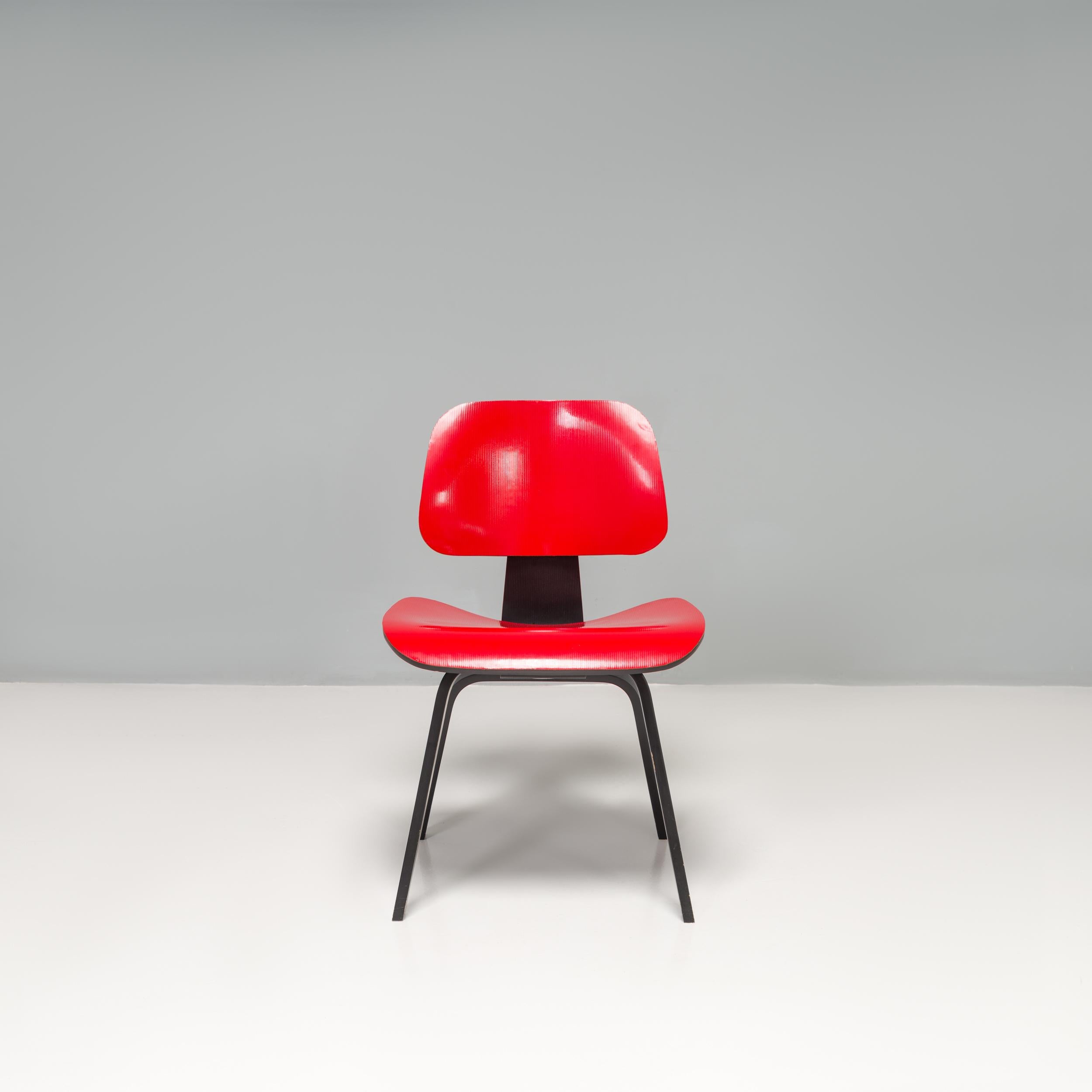 Mid-Century Modern Charles & Ray Eames for Herman Miller Red & Black DCW Armchair, 2004 For Sale