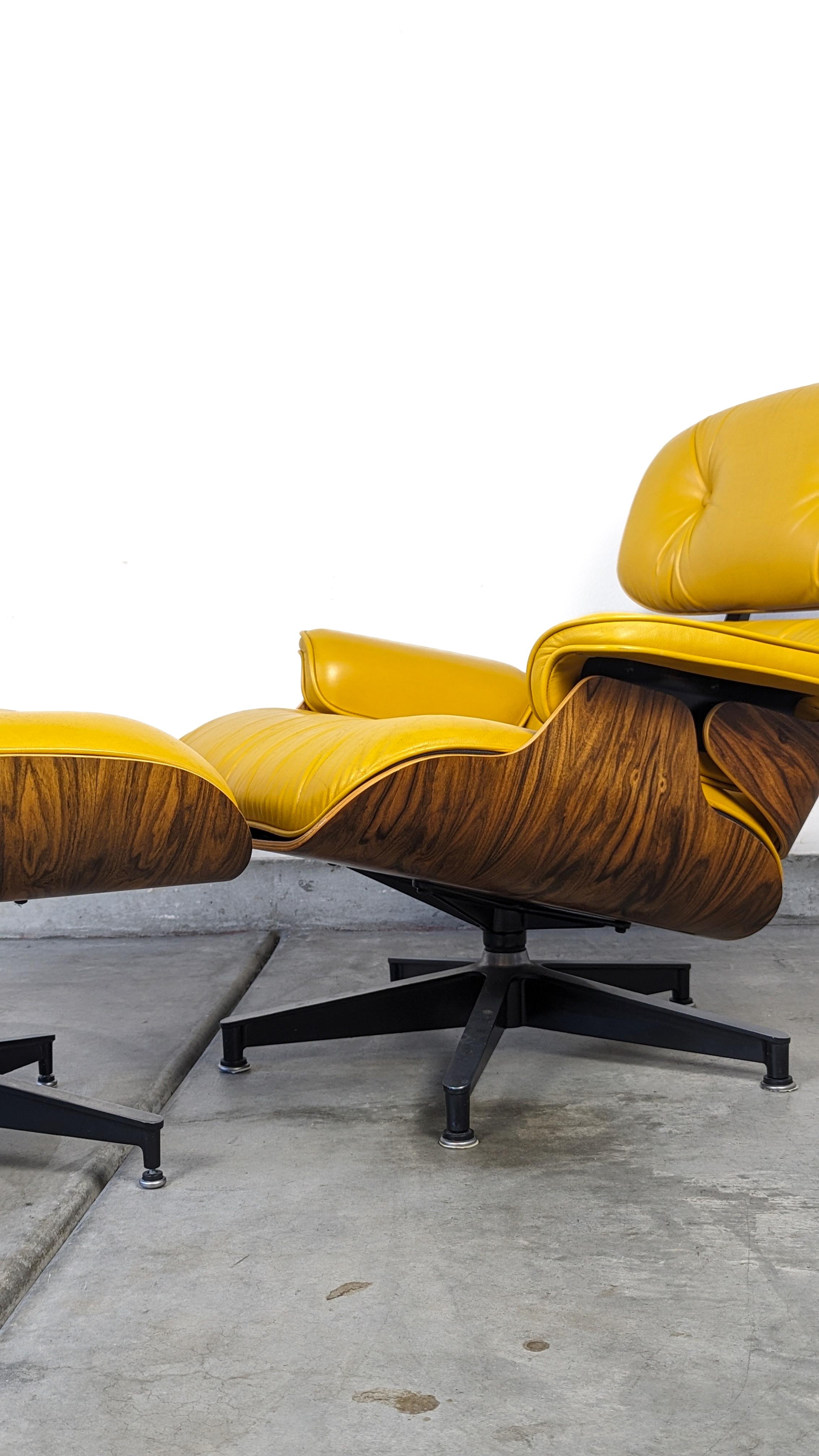 Step into a realm of timeless elegance and distinctive style with this iconic Eames Lounge Chair & Ottoman (670 & 671), crafted with precision for Herman Miller in 2008. This exquisite set diverges from the conventional with its vibrant yellow