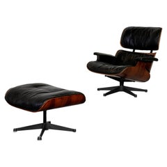 Charles & Ray Eames Lounge Chair and Footstool in Rosewood and Black Leather