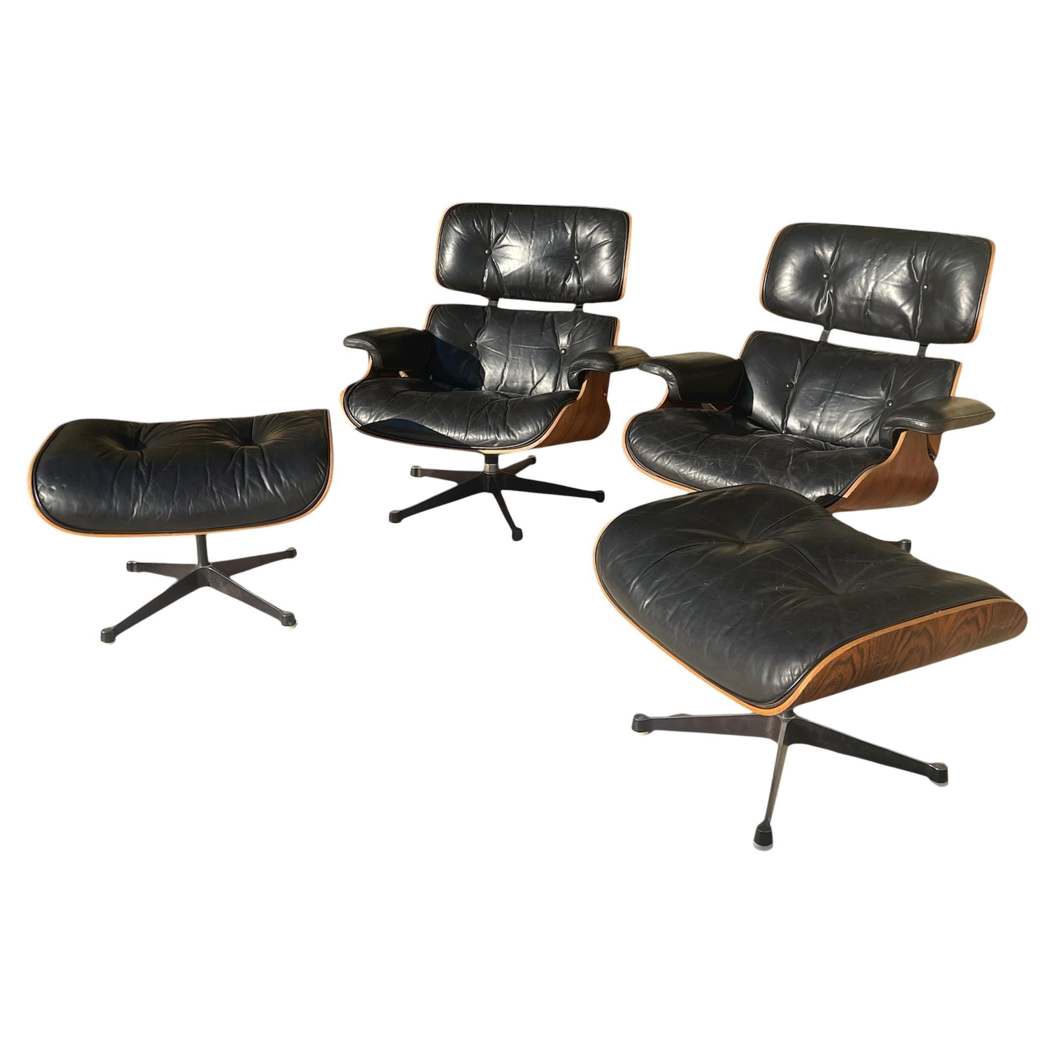 Charles and Ray Eames - Paire de fauteuils et d
ottomans