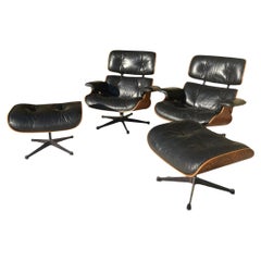 Charles and Ray Eames - Coppia di poltrone e ottomani