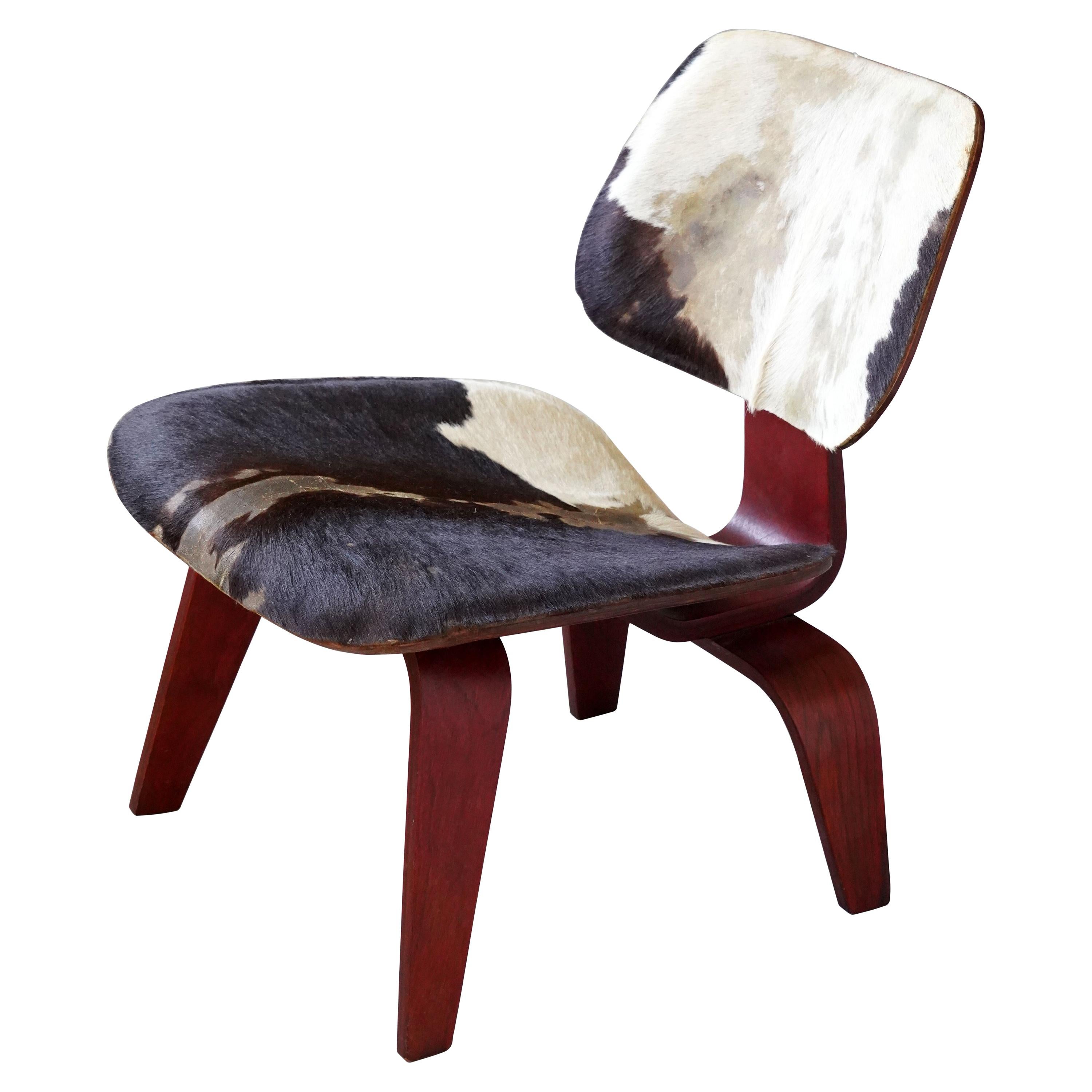 Charles & Ray Eames, Rare & Early LCW, Aniline Red Plywood, Cowhide, USA, 1940s