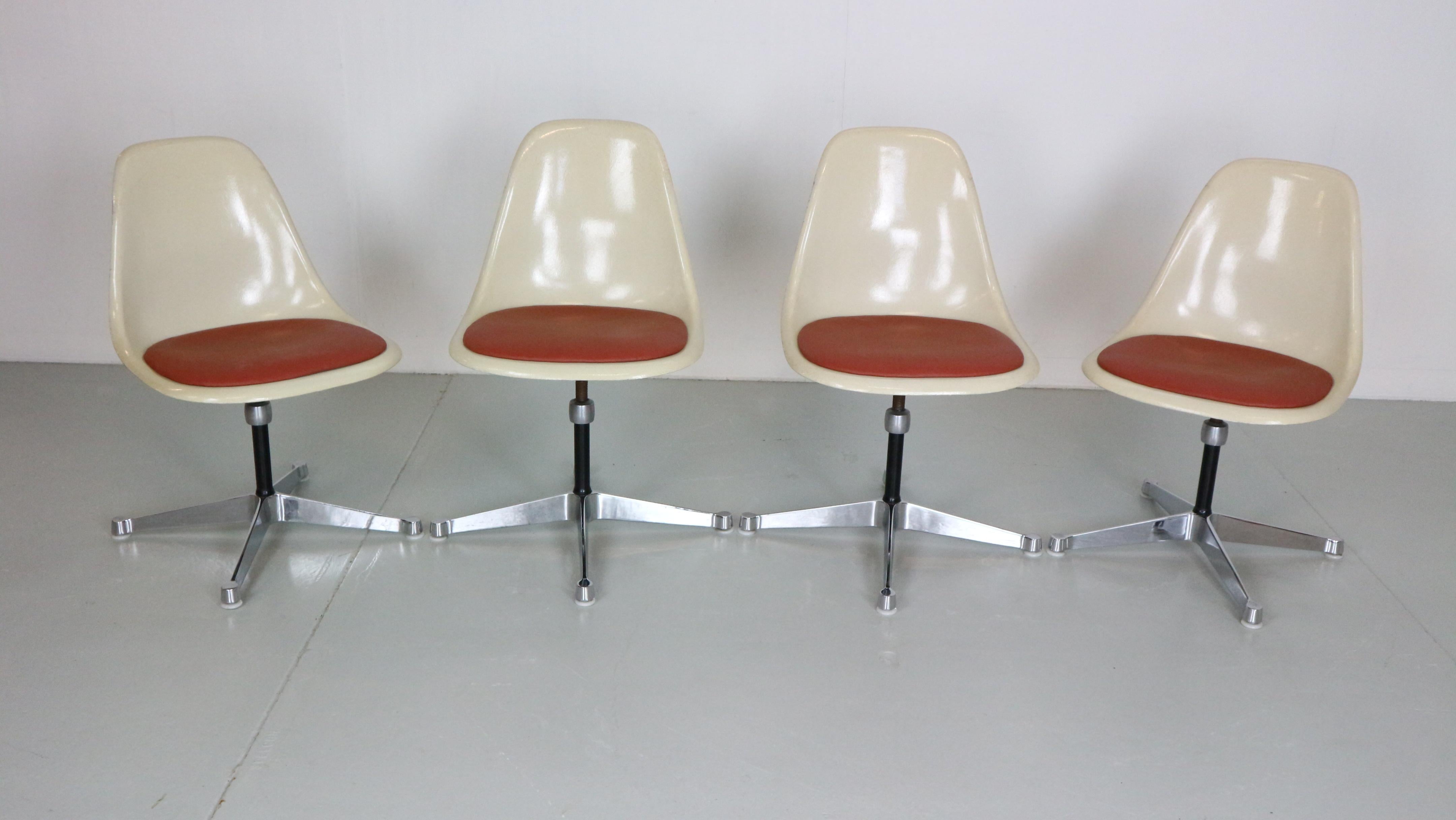 Set of 4 chairs designed by Charles& Ray Eames and manufactured for Herman Miller in 1960's circa, United States.

Chairs are in original condition. Marked under the base.
Made of fibreglass with seating cushions which were newly reupholstered in