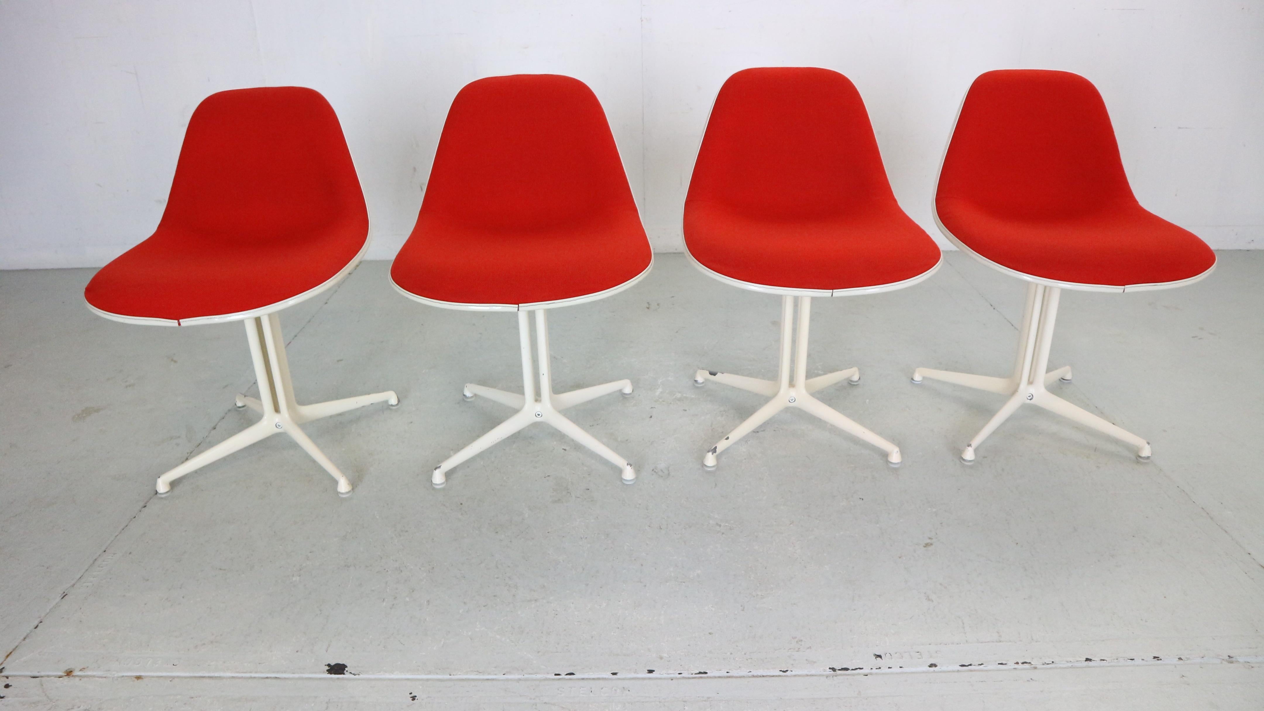 Mid- Century modern set of 4 dinning chairs designed by Ray and Charles Eames for Herman Miller, 1960's circa.

The 