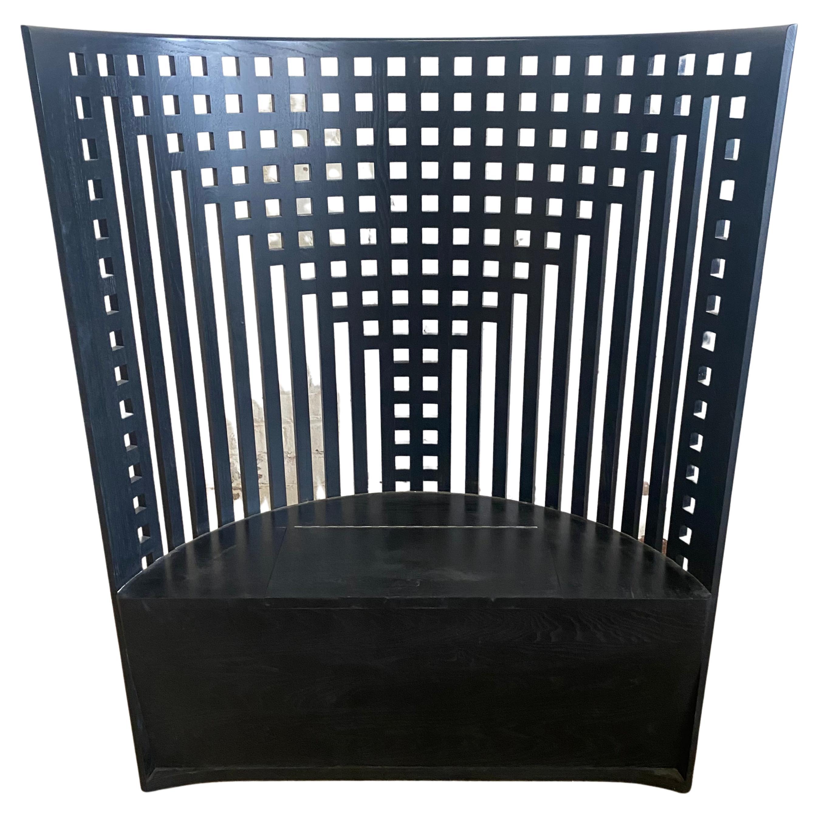 Trone -armchair designed by Charles Rennie Macintosh in 1904, Relaunched in 1973 , manufactured by Cassina in Italy..

This throne-like armchair is a later iteration of the model that CRM donated in 1904 to th 