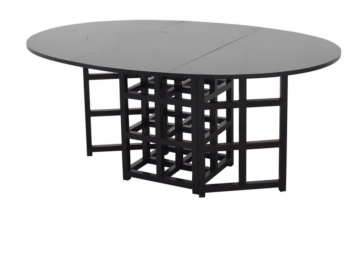 Charles Rennie Mackintosh ebonized ash folding oval table DS.1 Cassina, 1970s
Prestigious, oval table in black colored ash with two hinged, folding sides, model: 322 D.S.1, a design by the Scottish designer Charles Rennie Mackintosh dating from