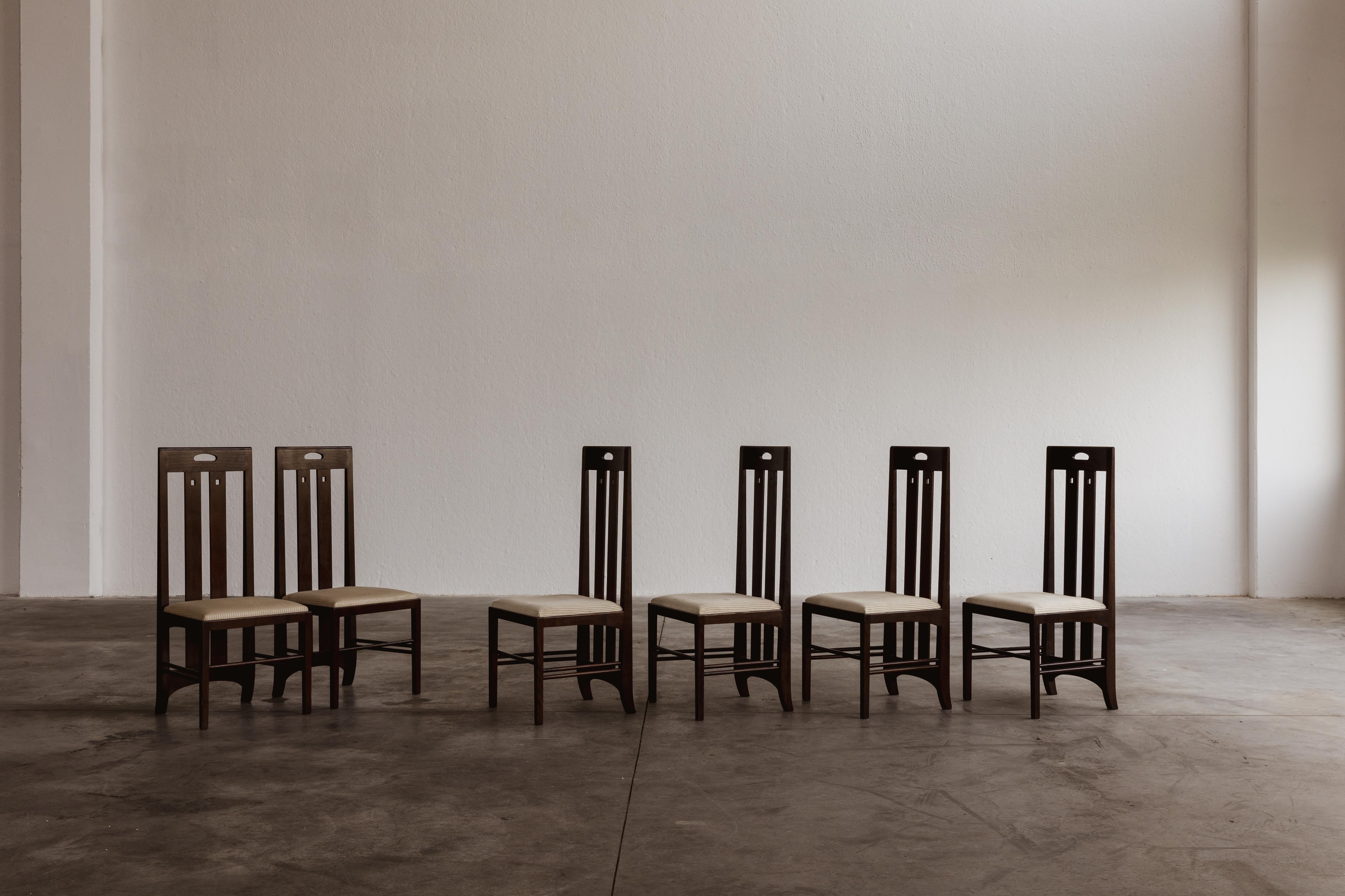 Charles Rennie Mackintosh “Ingram” dining chairs for Cassina, ash and fabric, United Kingdom, 1981, set of six.

The 
