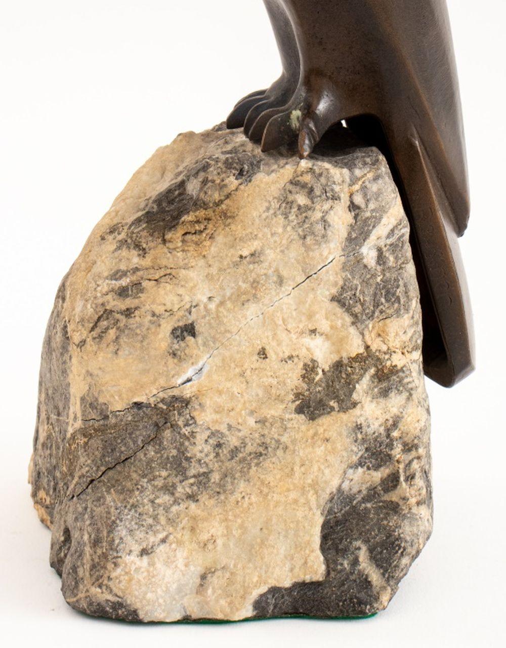 Charles Reussner (French, 1886-1961) animalier bronze statue depicting a hawk perched atop a granite base, signed to tail feather, 