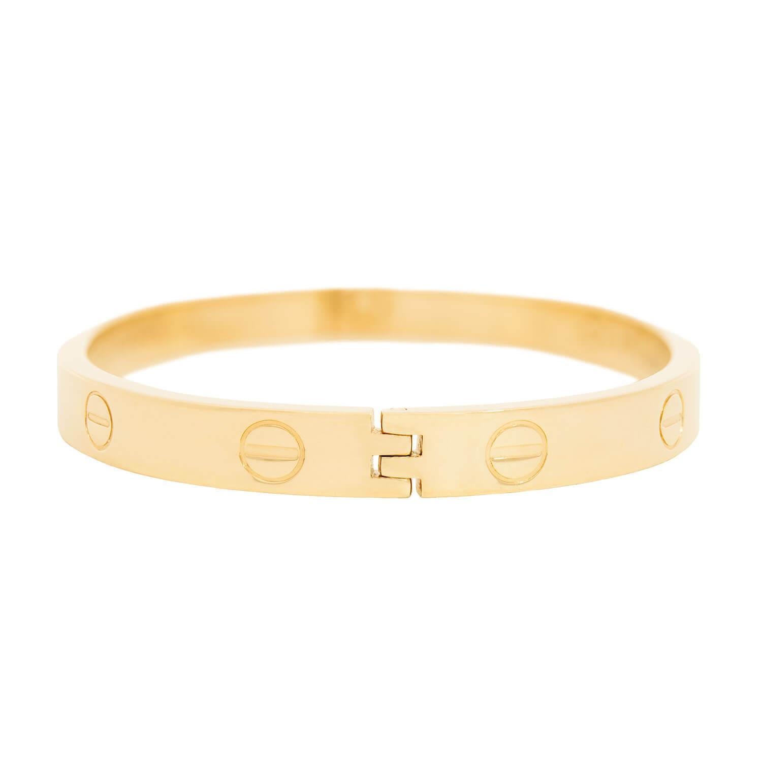 This very unusual Vintage bracelet (ca1970s) is based on the original LOVE Collection designed by Aldo Cipullo for Cartier. Originally and most commonly produced in solid gold or platinum, this particular bracelet was commissioned by Charles Revson