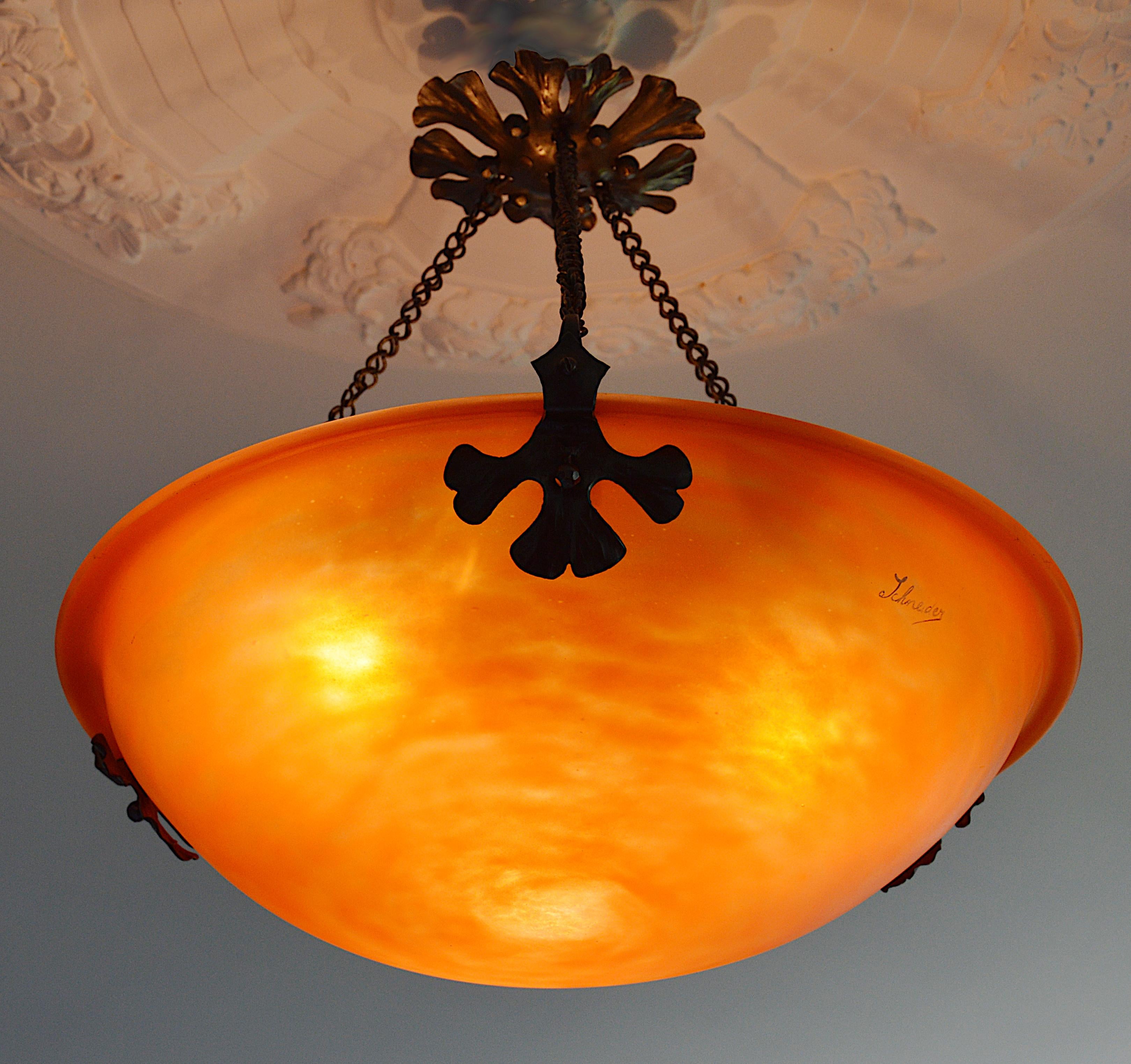 Large French Art Deco chandelier by Charles Schneider, Epinay-sur-Seine (Paris), early 1920s. Mottled glass shade, powders are applied between two layers that comes hung at its original wrought iron fixture by Schneider. Same period as Daum, Muller