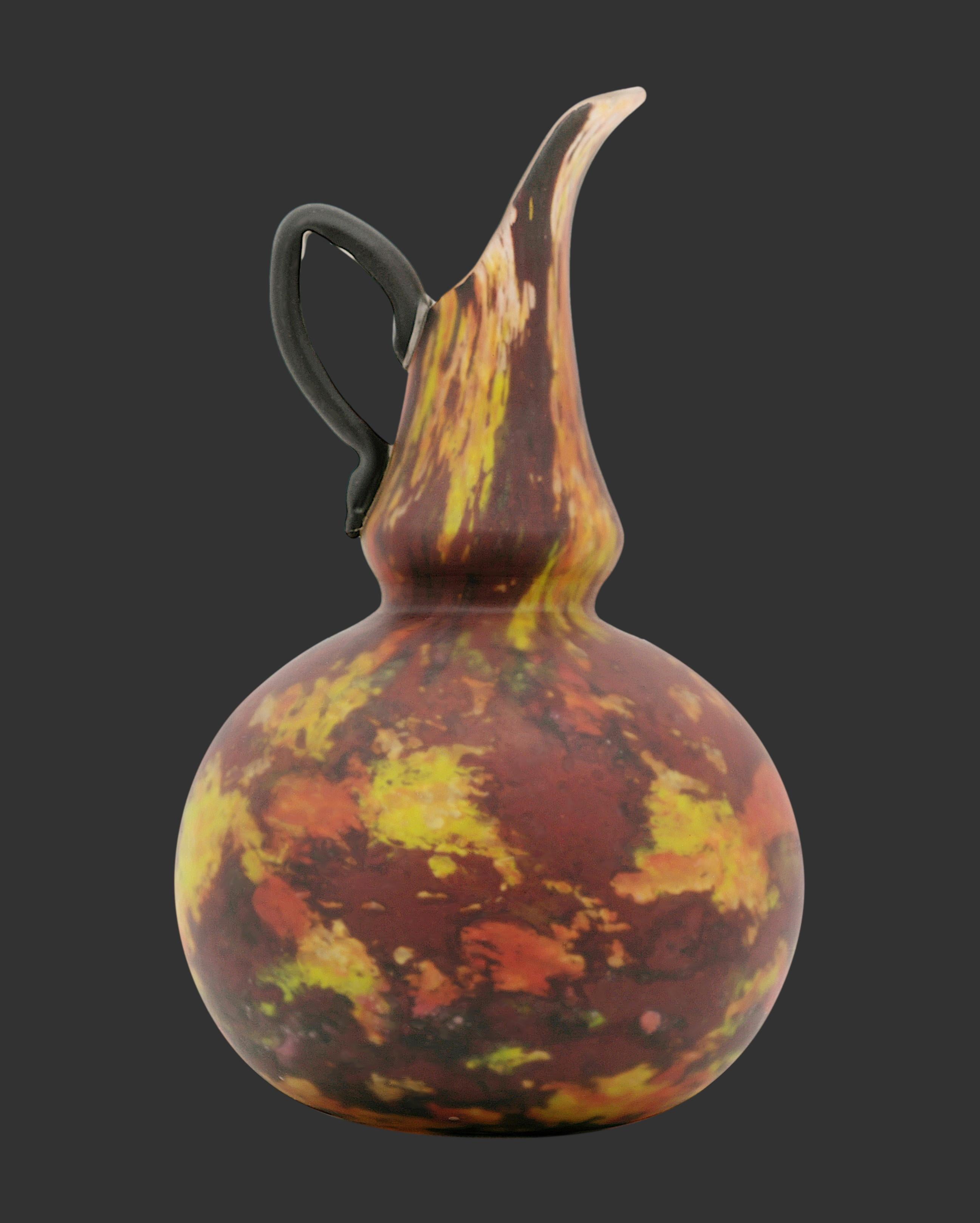 French Art Deco pitcher ewer by Charles Schneider, Epinay-sur-Seine (Paris), 1924-1928. Large and heavy  pitcher or ewer in mate mottled warmly colored glass. Enamels are applied applied between to layers. Schneider pieces are rare in matte finish.