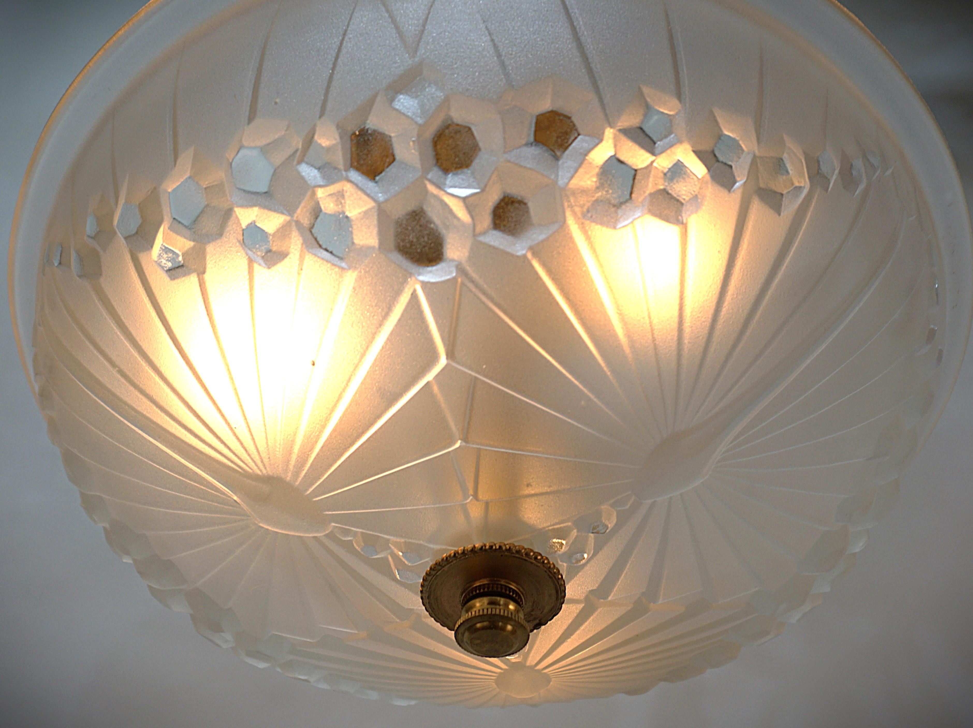 Clear Forst glass with bronze hardware semi flush mount light by Charles Schneider.
Professionally rewired and ready for installation.
Three lights, 100watts max each. 