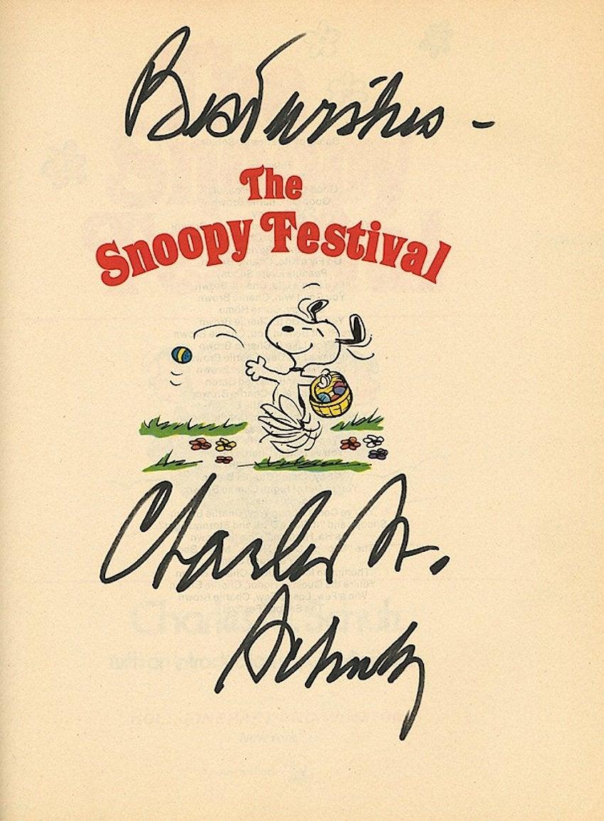 A copy of cartoon book The Snoopy Festival signed by Charles Schulz
American cartoonist Charles Schulz (1922-2000) is best known for his comic strip Peanuts which featured the now iconic characters Charlie Brown and Snoopy.

Peanuts was published