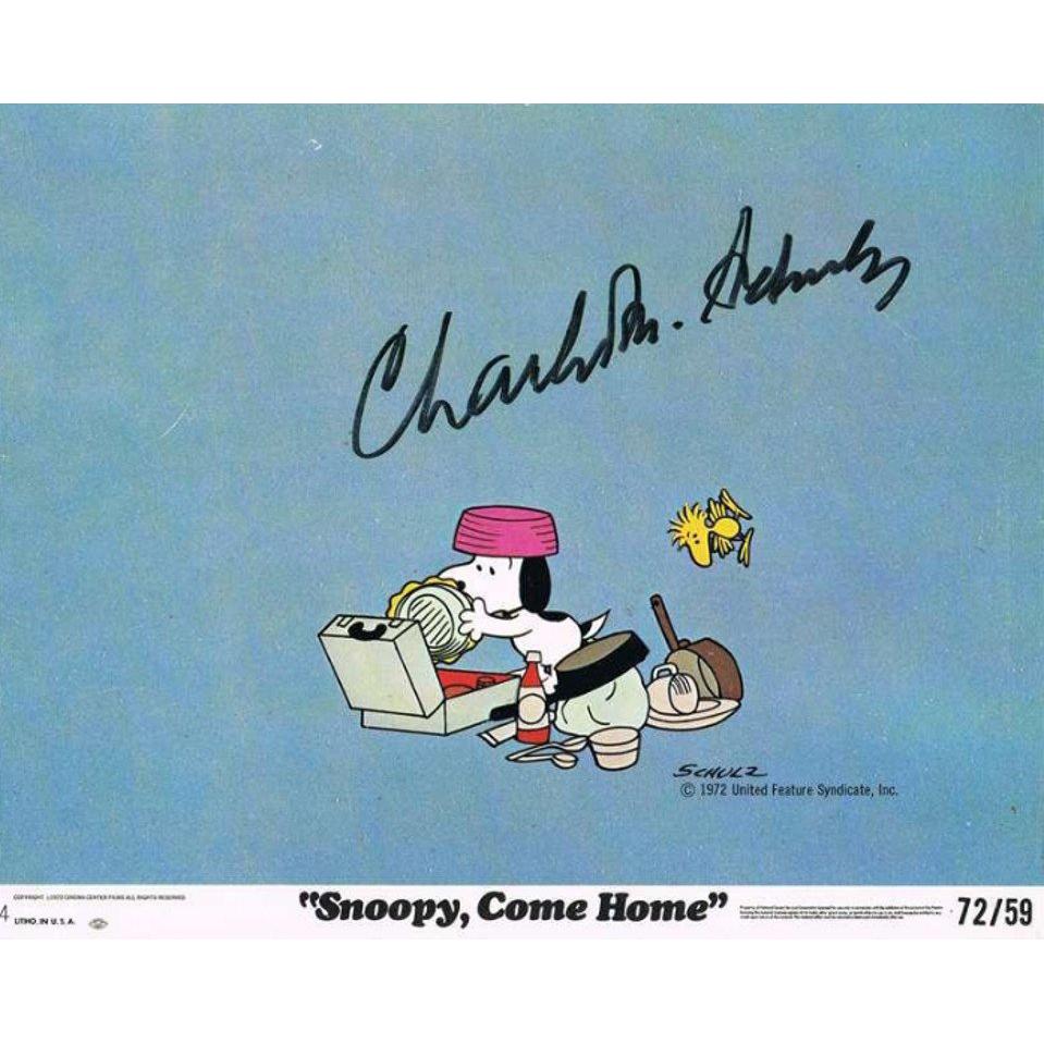 Charles Schulz genuine autograph on Snoopy, Come Home lobby card
