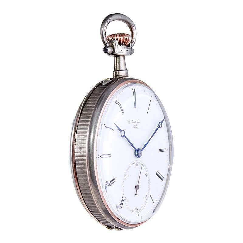 FACTORY / HOUSE: Charles Tissot
STYLE / REFERENCE: Open Faced Pocket Watch
METAL / MATERIAL: Silver and Gold with Coin Edge
CIRCA / YEAR: 1900's
DIMENSIONS / SIZE: 49mm
MOVEMENT / CALIBER: Manual Winding / 17 Jewels 
DIAL / HANDS: Kiln Fired Enamel