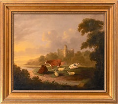 A river landscape, with cattle and sheep resting before castle ruins