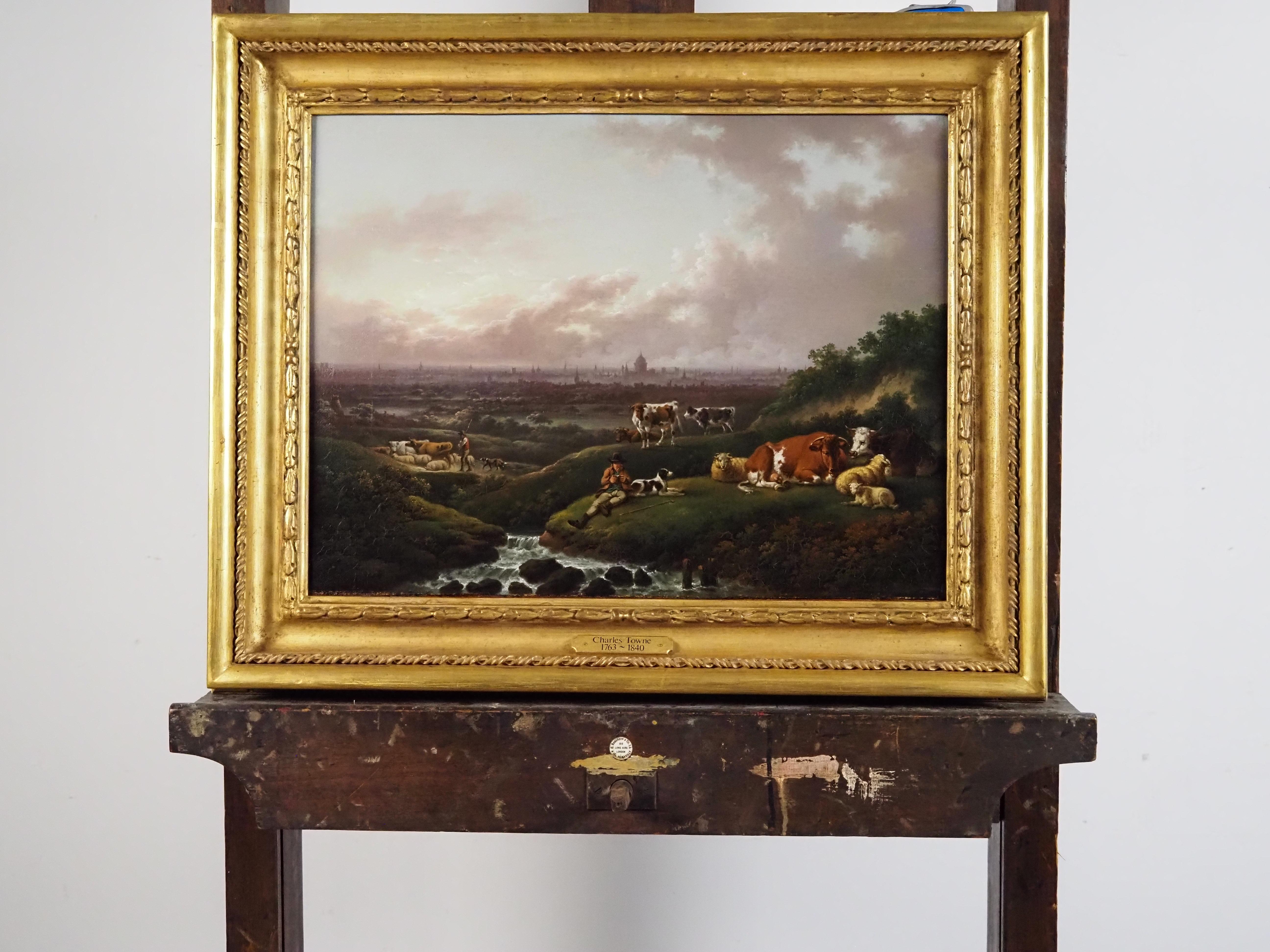 Charles Towne (1763-1840)
London : A distant view of the city from the south with a herdsman and cattle in the foreground
Oil on canvas laid on panel
Canvas Size - 14 1/2 x 19 in
Framed Size - 19 x 24 in

Provenance
Sale, Christie's London, 12th