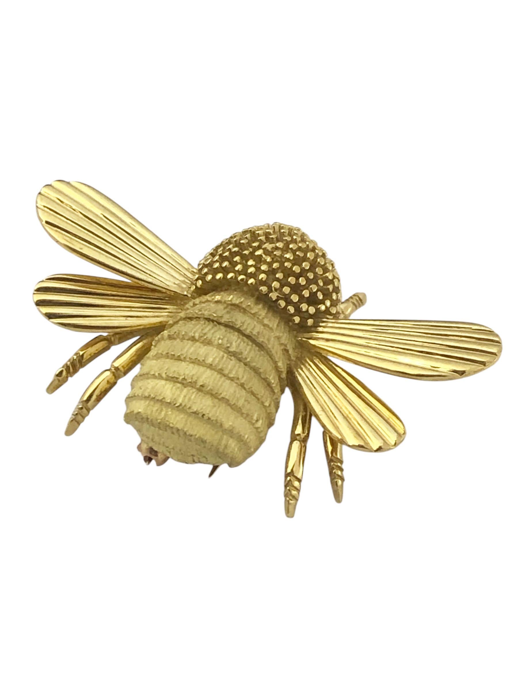 Circa 2000 Charles Turi Bumble Bee brooch, measuring 1 1/8 inches in length,  1 3/4 inches from wing tip to tip and weighing 18.7 grams. Very nicely detailed with hand textured finishing. Having a Double Clip pin fastener. 