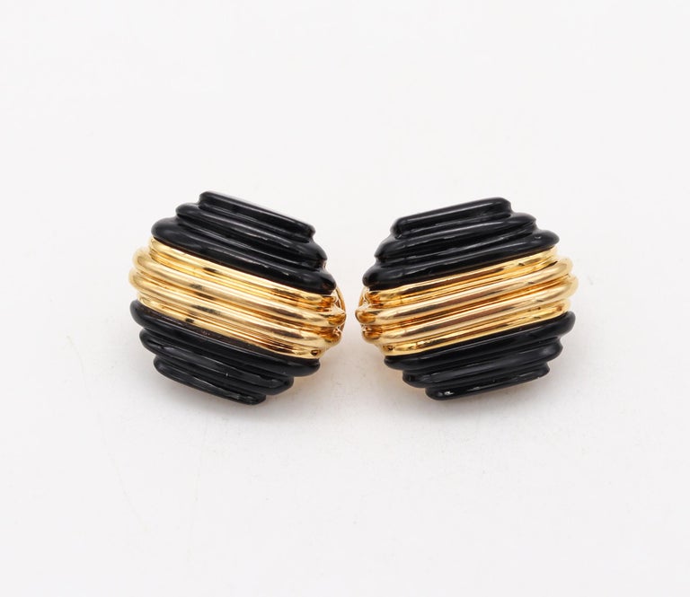A pair of clip earrings designed by Charles Turi.

Beautiful stepped pair, created in the United Stated at the beginning of the 1980's by American-Hungarian jewelry designer Charles Turi. This statement earrings are a one-of-a-kind pair, crafted