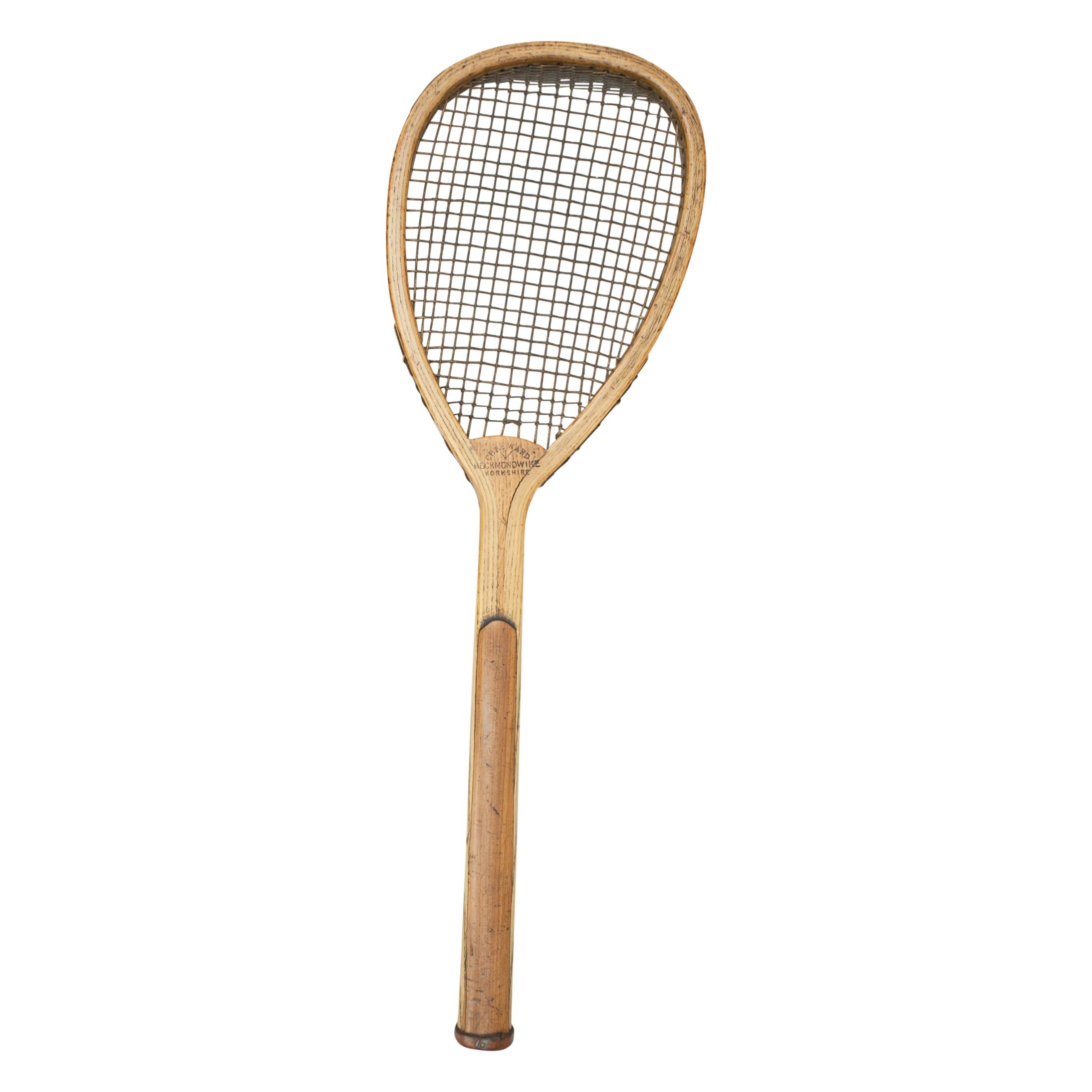Antique Lopsided Charles Ward lawn tennis racket.
A rare, early lopsided (tilt head) lawn tennis racquet in good original condition by Chas. Ward, Heckmondwike, Yorkshire. The ash frame is in very good condition. The convex wedge stamped with the
