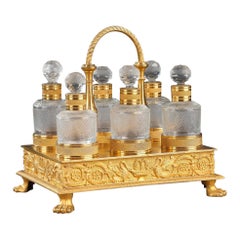 Cellaretto per profumi Charles X in cristallo tagliato e bronzo dorato.