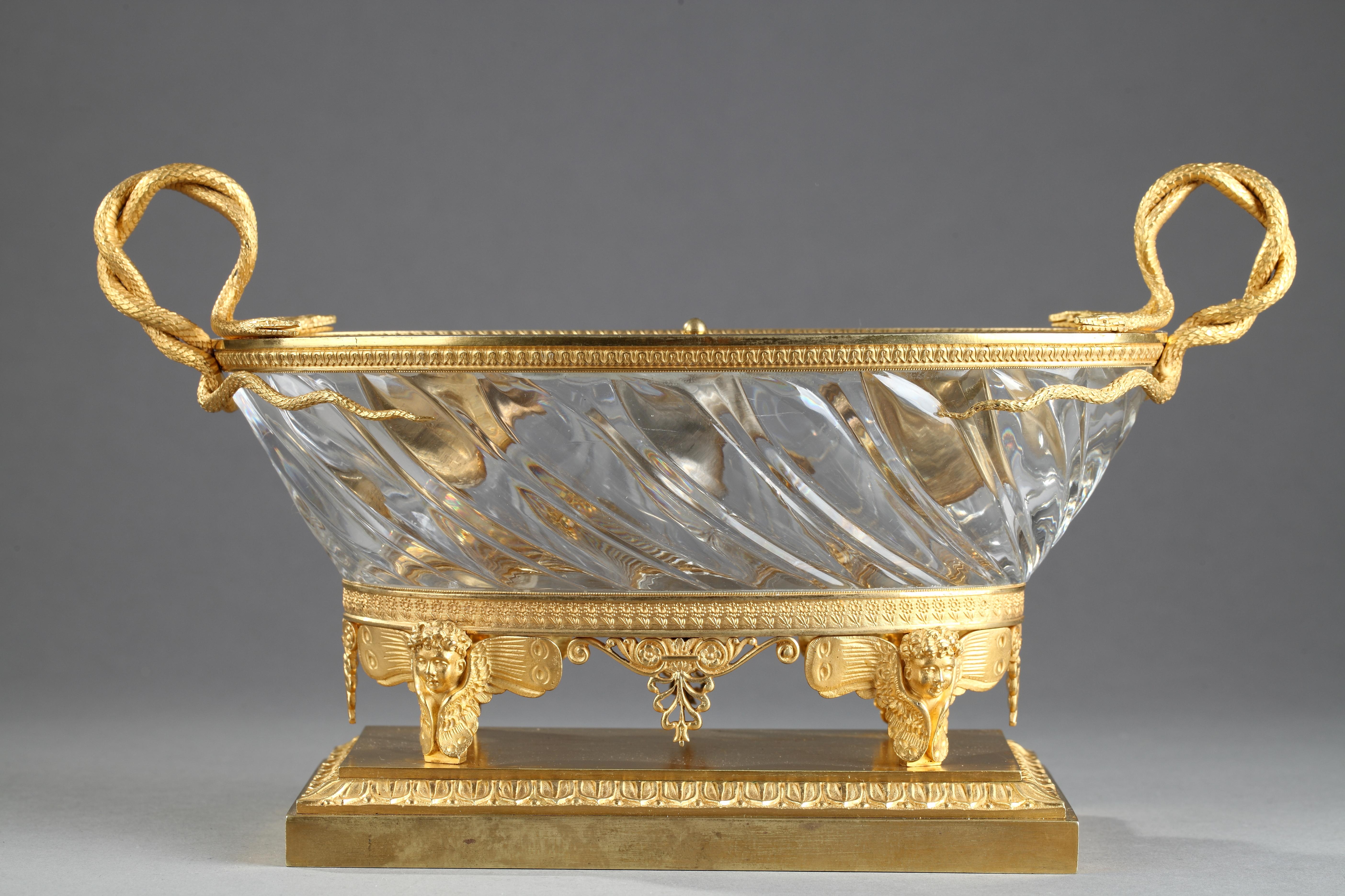 Exceptional inkwell in cut and engraved crystal in gilded bronze mount. The crystal has a so-called 