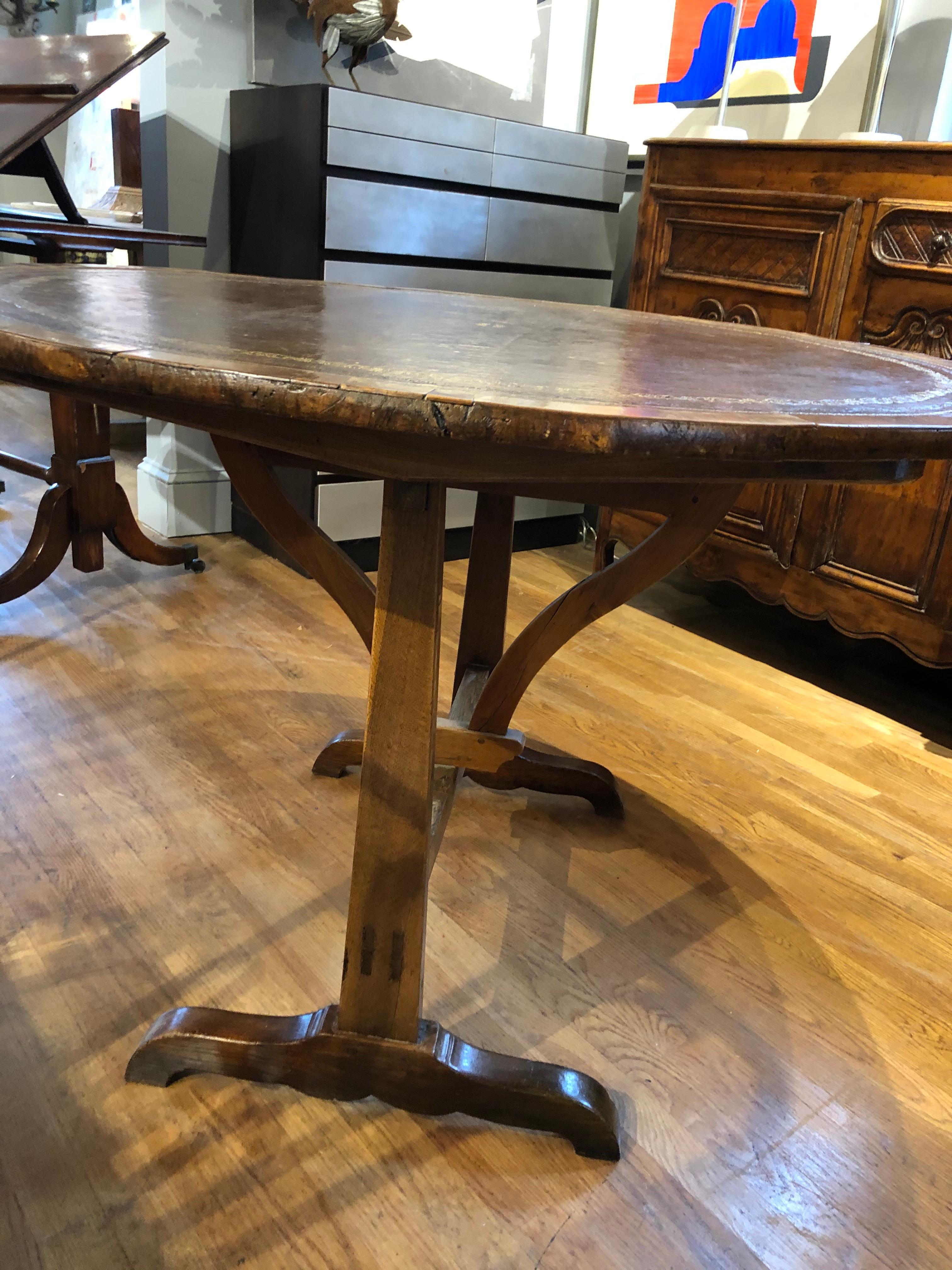 Gilt Charles X French Provincial Tooled Leather Tilt-Top Walnut and Oak Wine Table