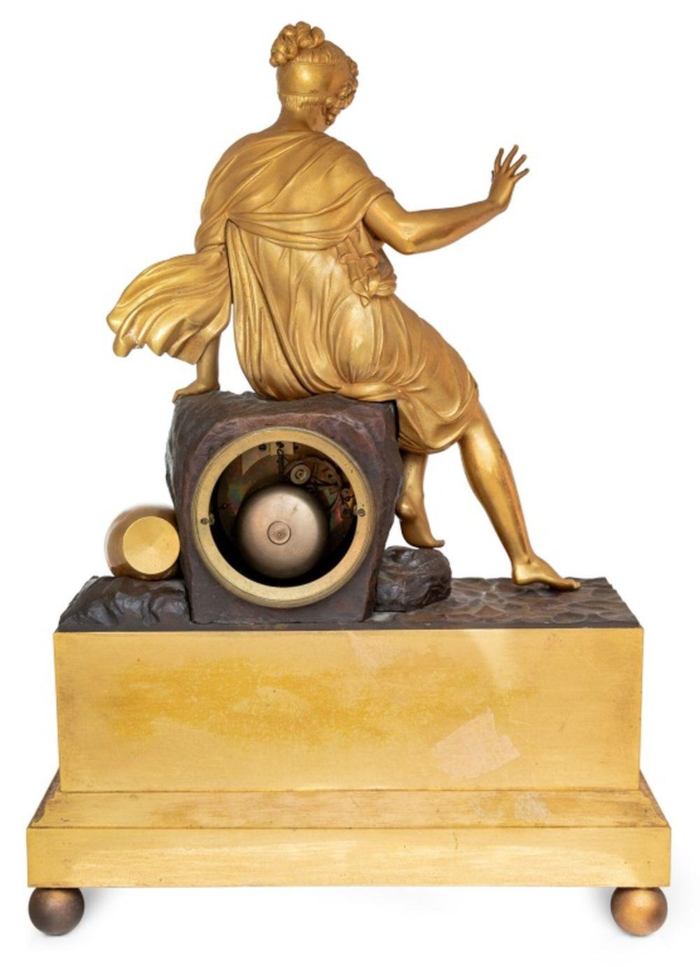 Charles X Gilt and Patinated Bronze Figural Clock In Good Condition For Sale In Astoria, NY