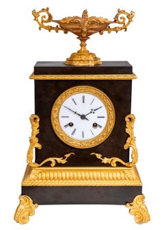 Charles X Gilt and Patinated Bronze Mantel Clock