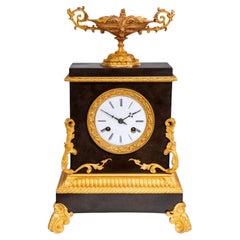 Charles X Gilt and Patinated Bronze Mantel Clock